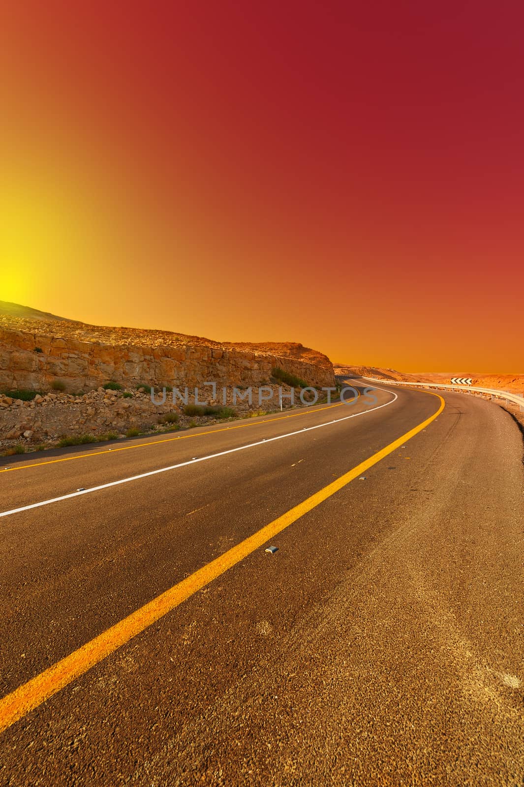 Asphalt Road in the Judean Desert on the West Bank, Sunset 