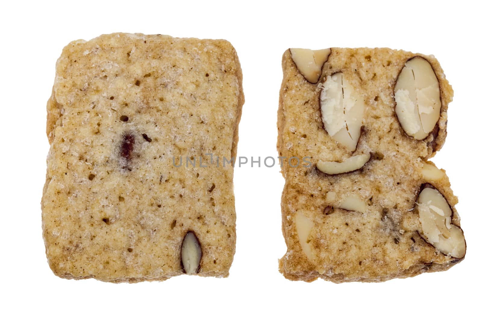 Biscuit with seeds and jam isolated against a white background.