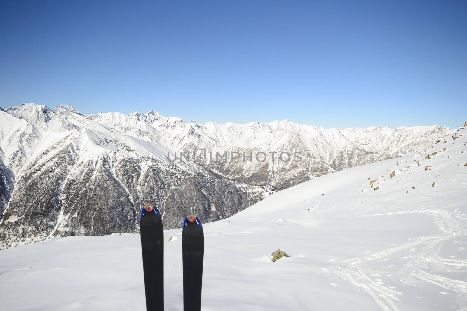 Back country ski in scenic alpine backgrounds