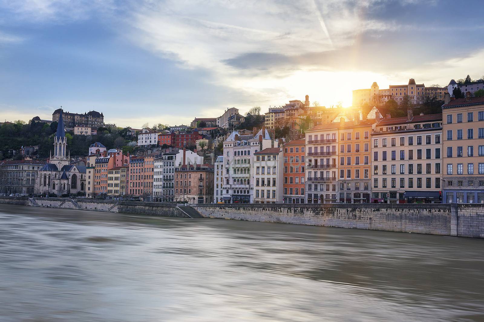 Famous view of Saone river in Lyon city at sunset, France 