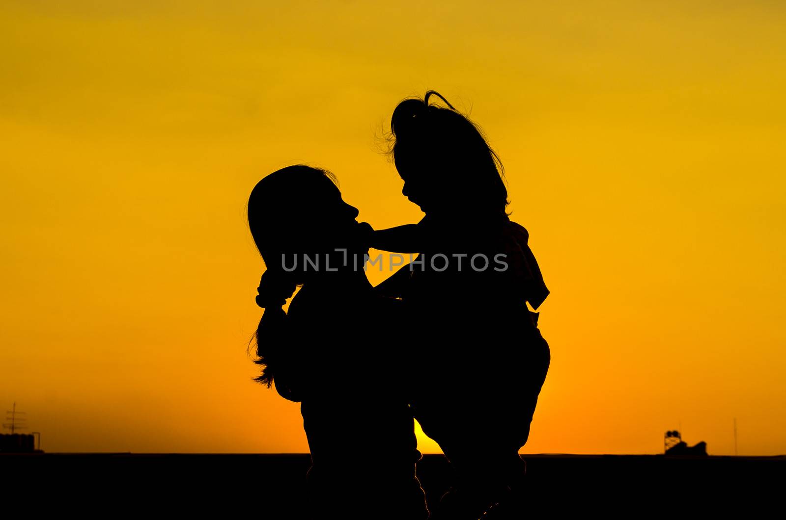 Mom and baby Silhouette  by thekaikoro