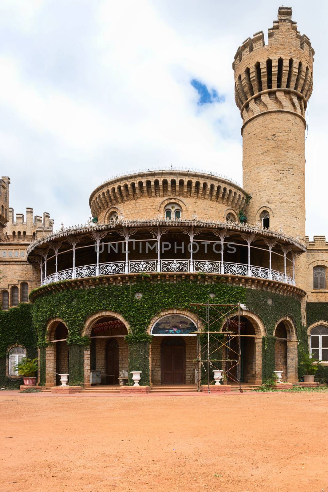Detail of the majestic Bangalore Palace showing rotunda and watchtower in Bengaluru, India.