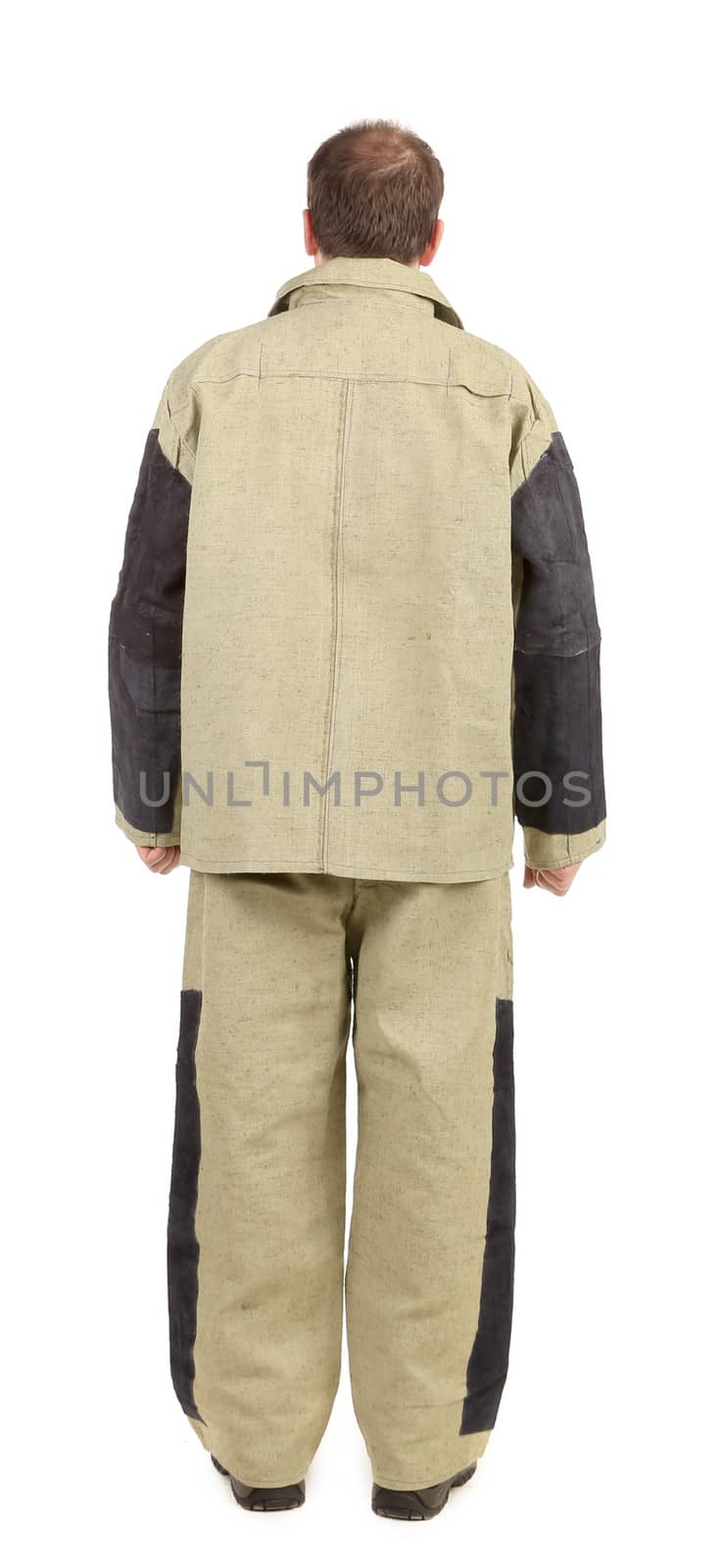 Welder in workwear suit. Back view. Isolated on a white background.