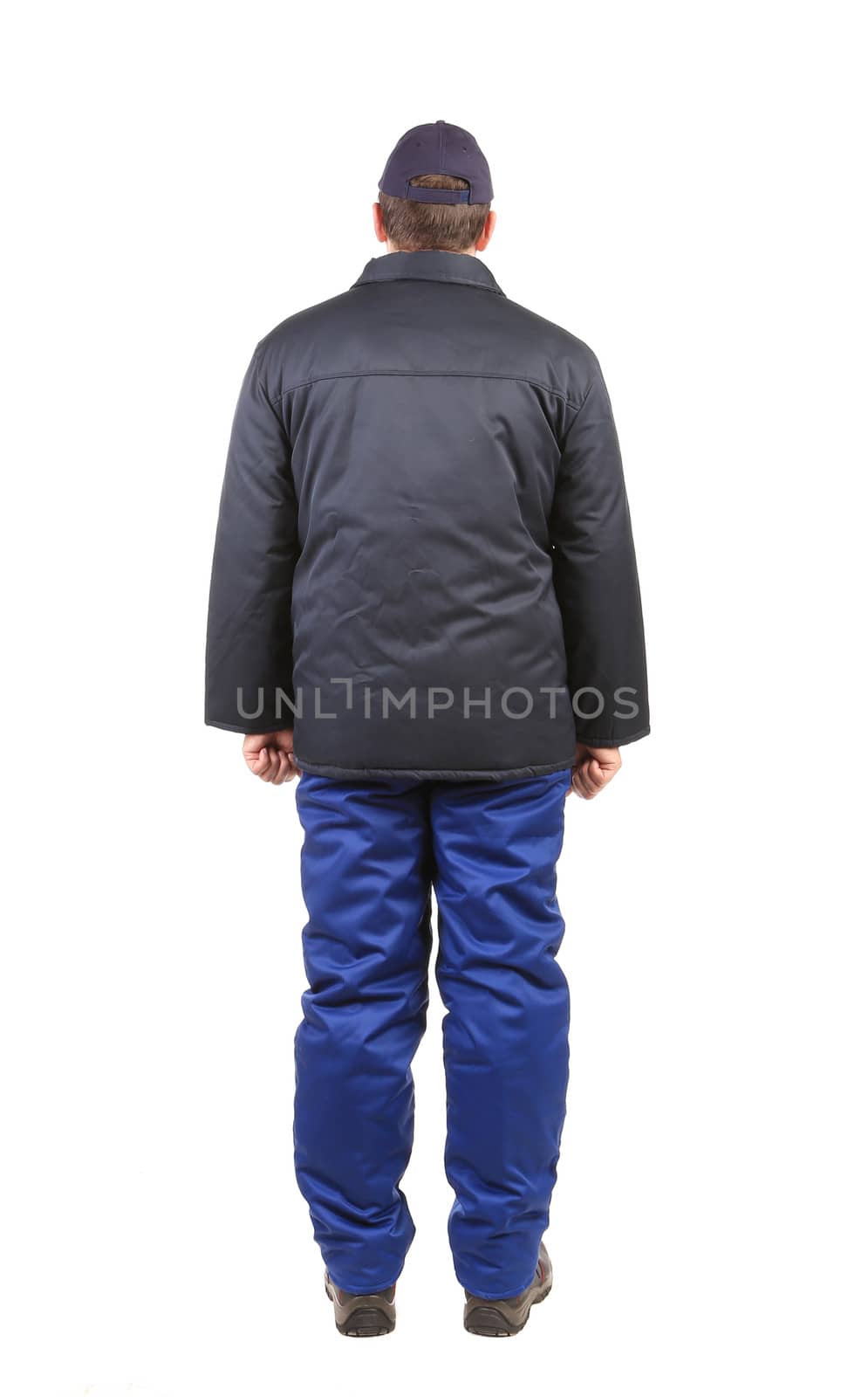 Worker in winter workwear. Back view. Isolated on a white background.