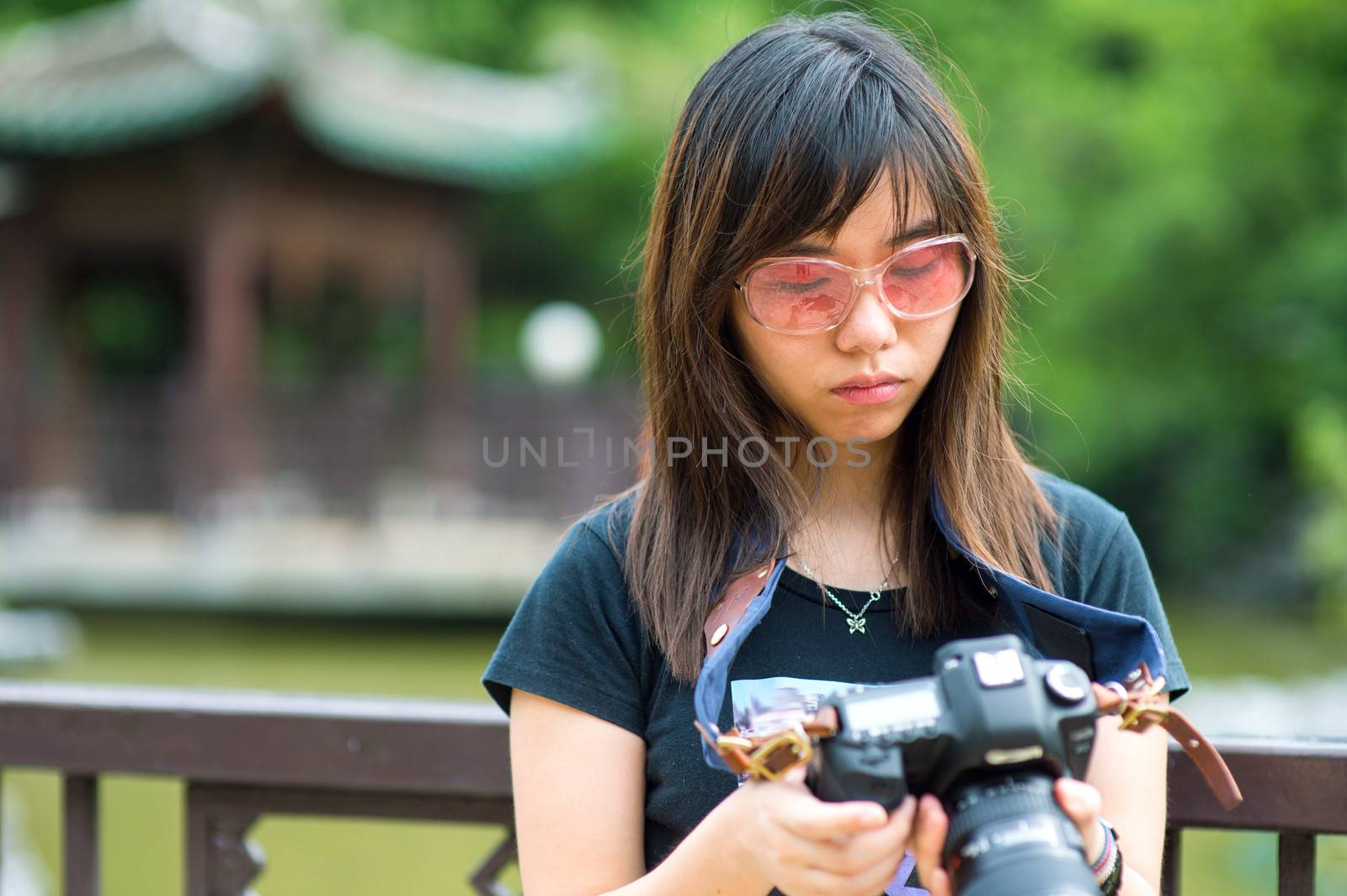 Asian photographer in Hong Kong
