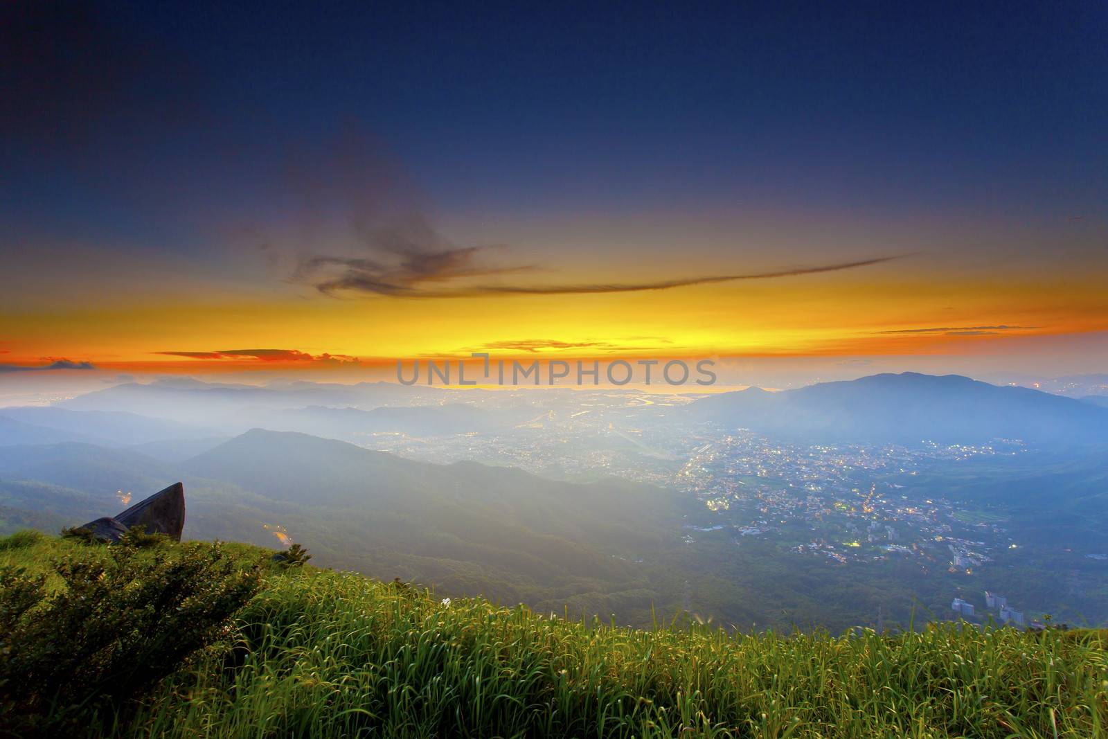 Sunset mountains with moody clouds