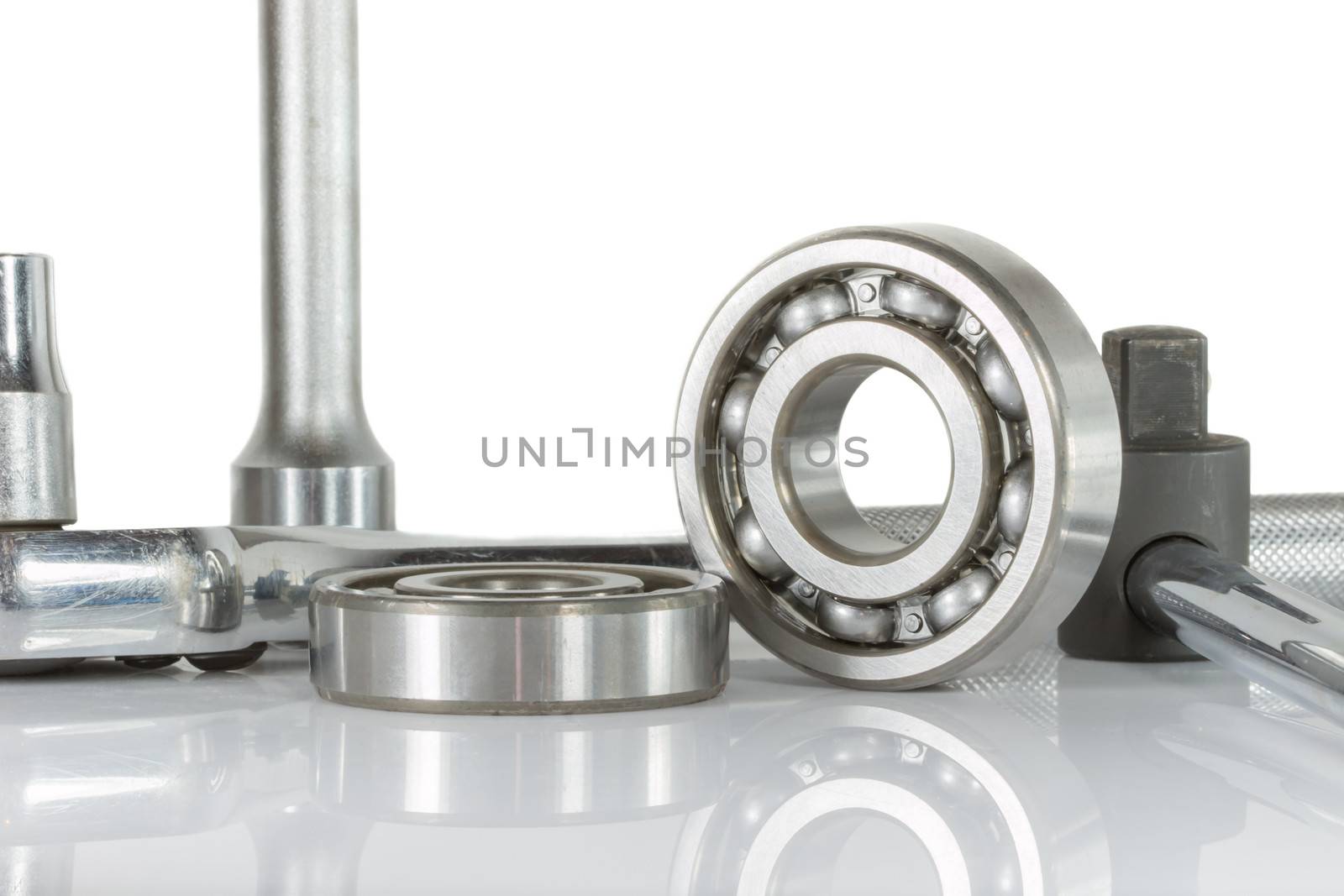 ball bearing with drive socket set , on over white, and reflections