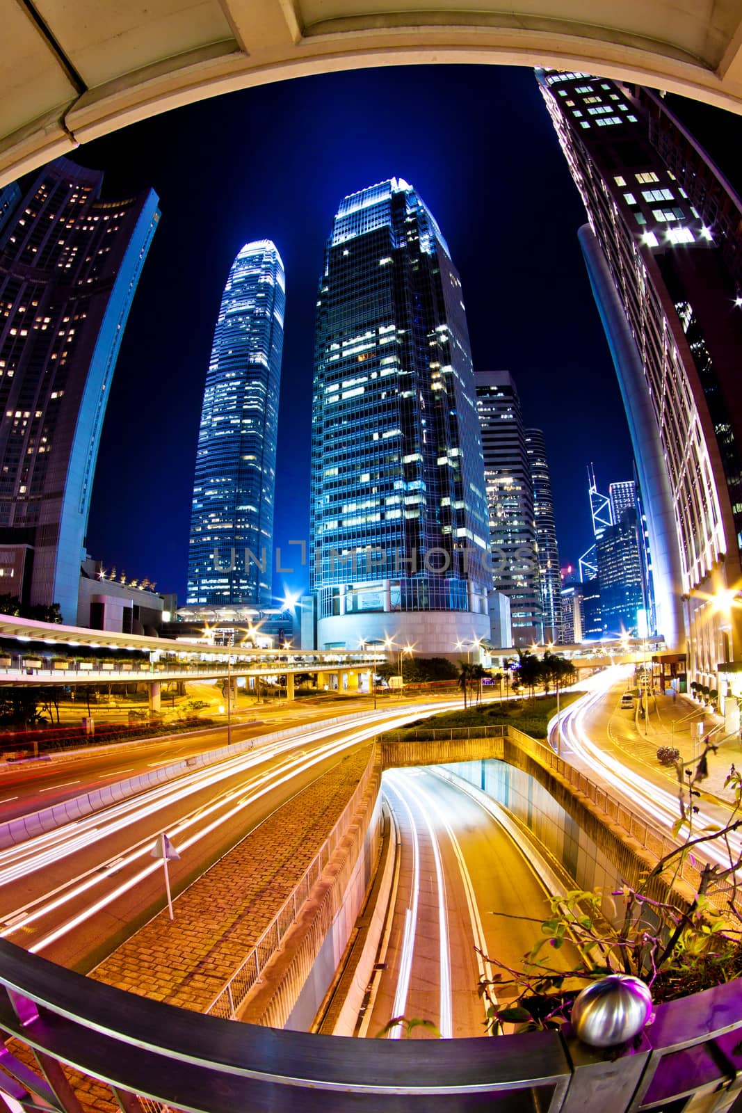 Traffic in city at night in Hong Kong by kawing921