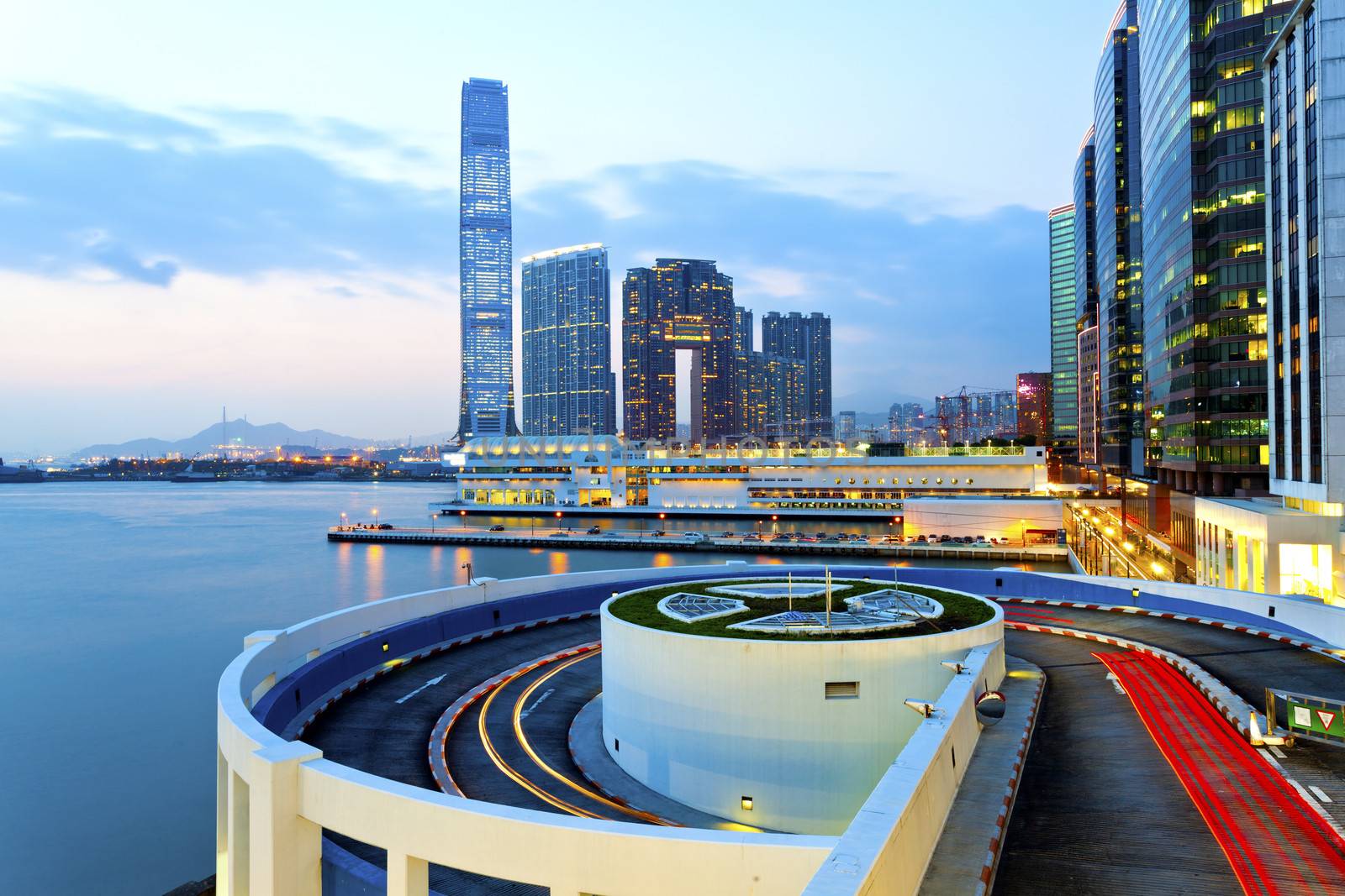 Sunset summer in Hong Kong downtown with high-rise buildings by kawing921