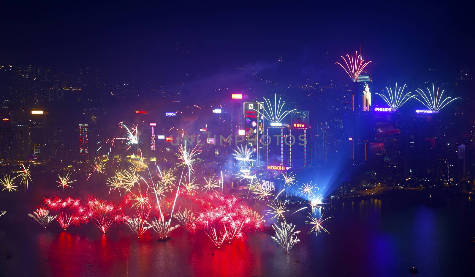 HONG KONG - 1 JANUARY: A splendid firework show and countdown celebration held in Hong Kong on 1 January, 2014. The show lasted for 8 minutes and lighted up the skies above the iconic Hong Kong skyscrapers. 