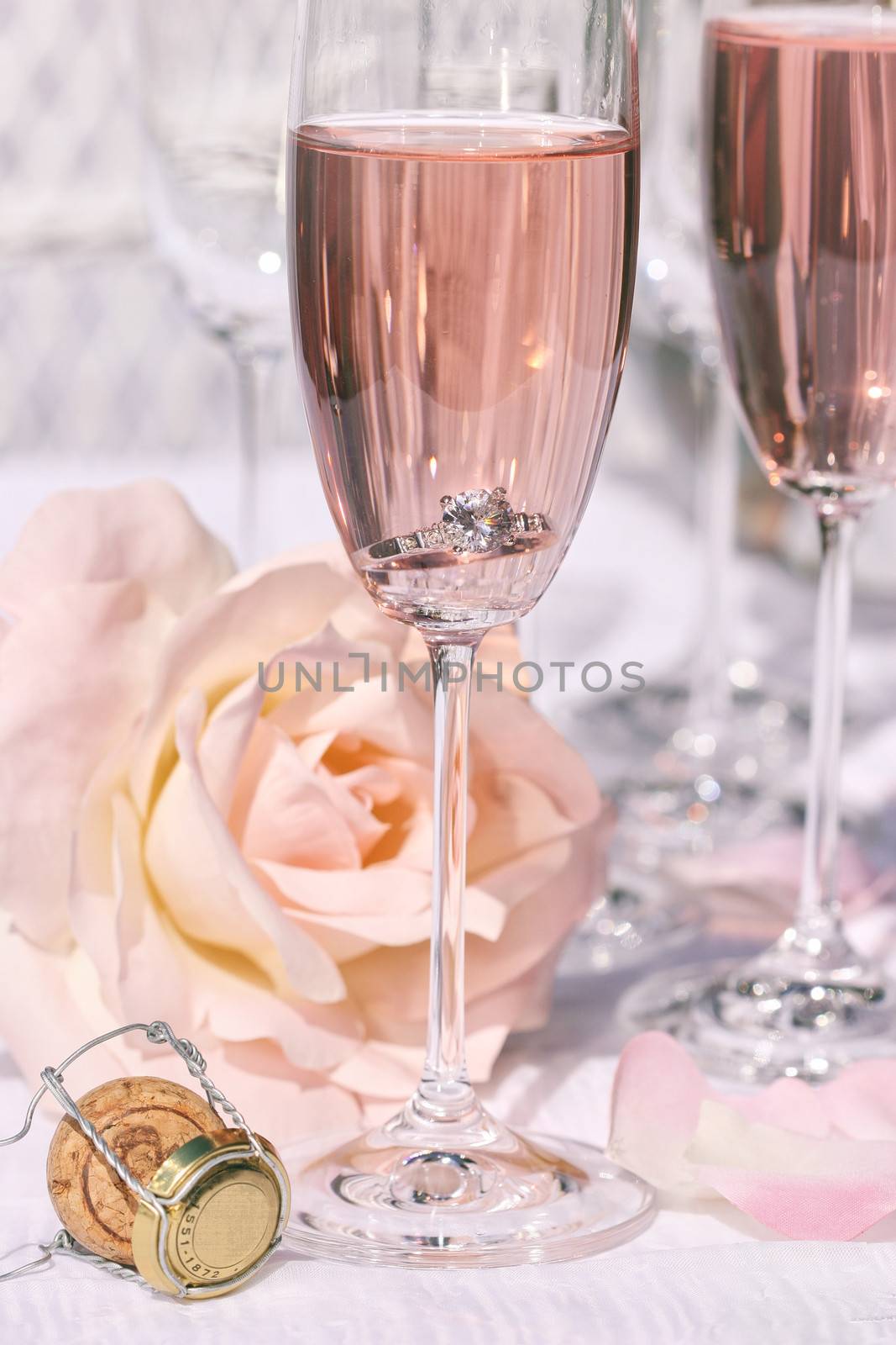 Ring in pink champagne with flowers