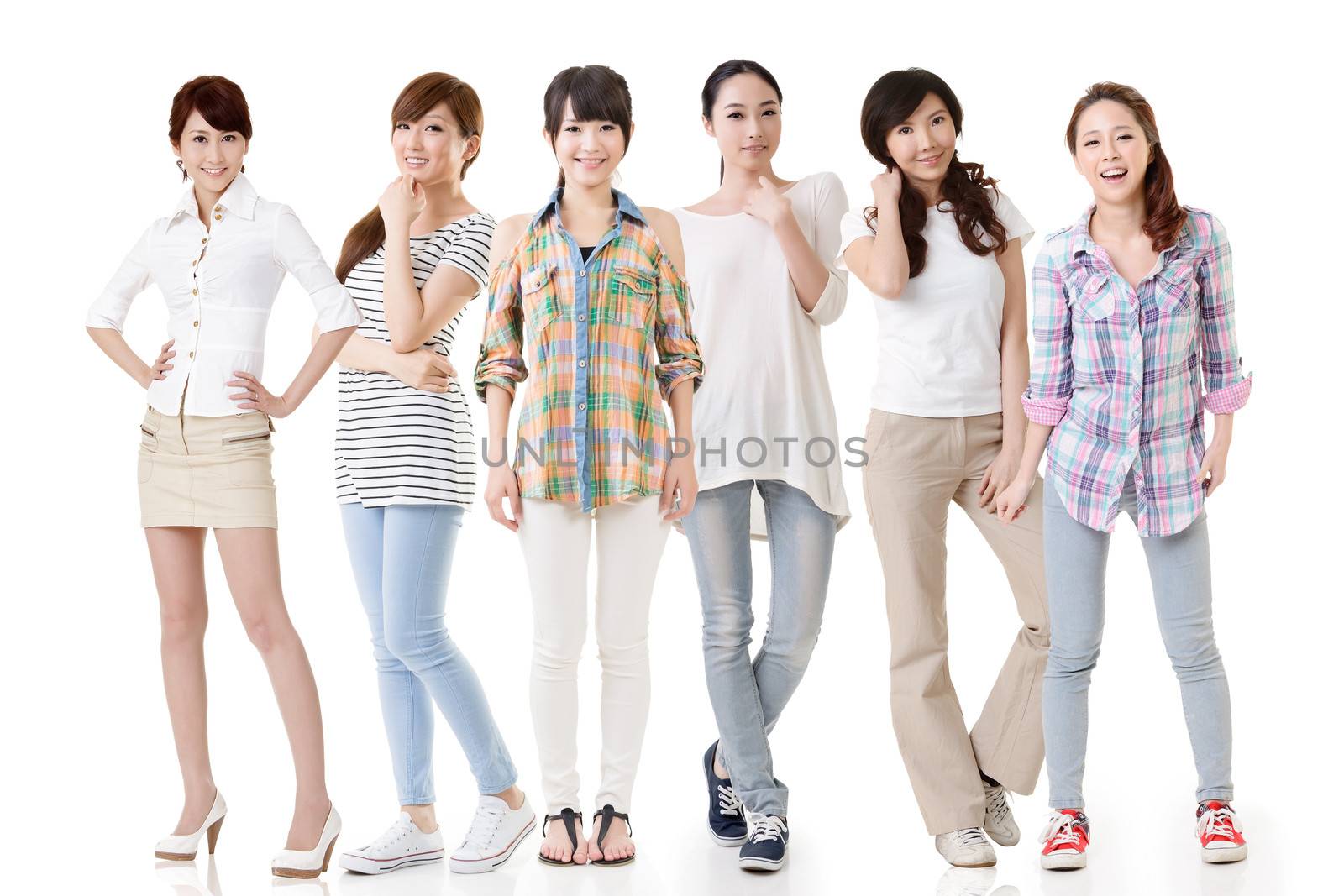 Young asian beautiful women posing for the camera. Full length portrait. Isolated on the white background.