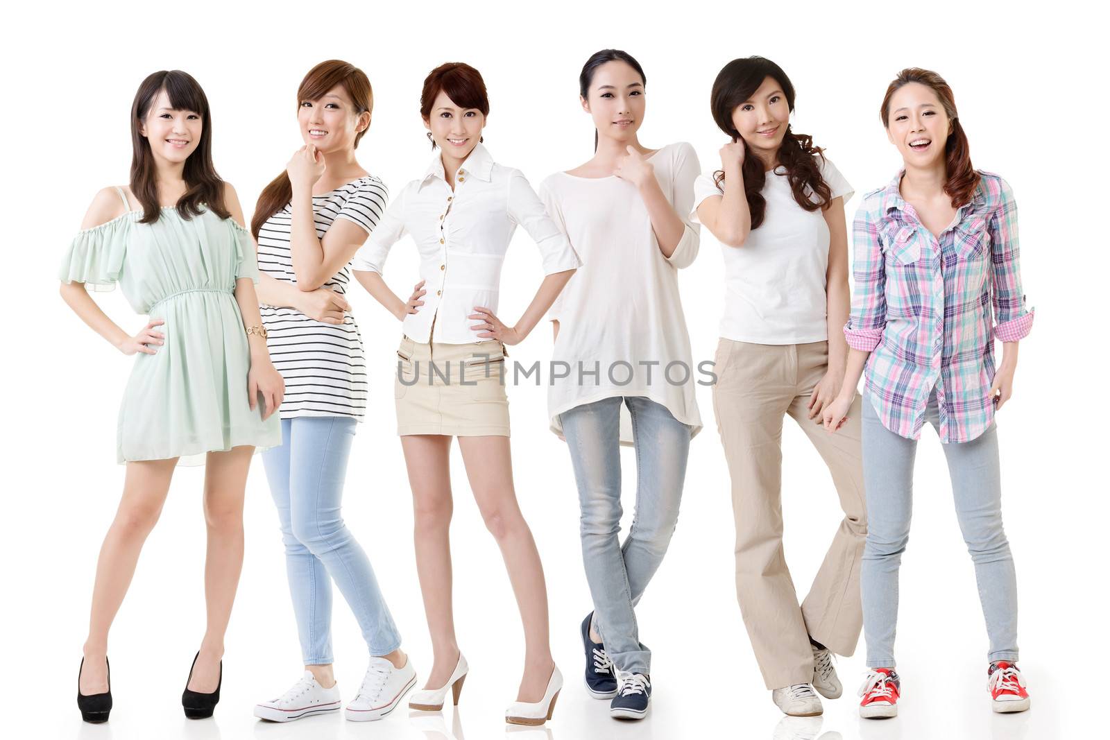 Young asian beautiful women posing for the camera. Full length portrait. Isolated on the white background.