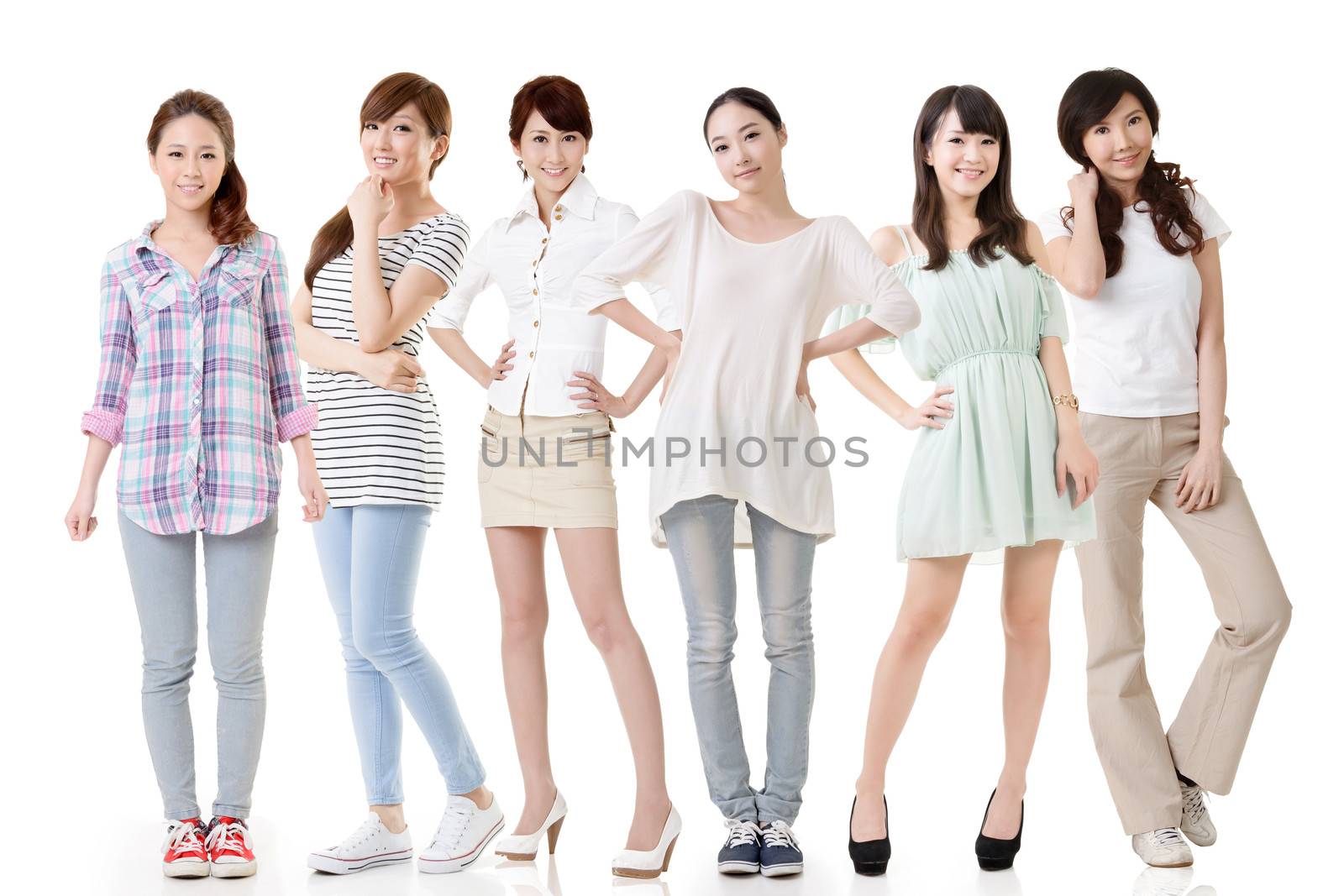 Young asian beautiful women posing for the camera. Full length portrait. Isolated on the white background.