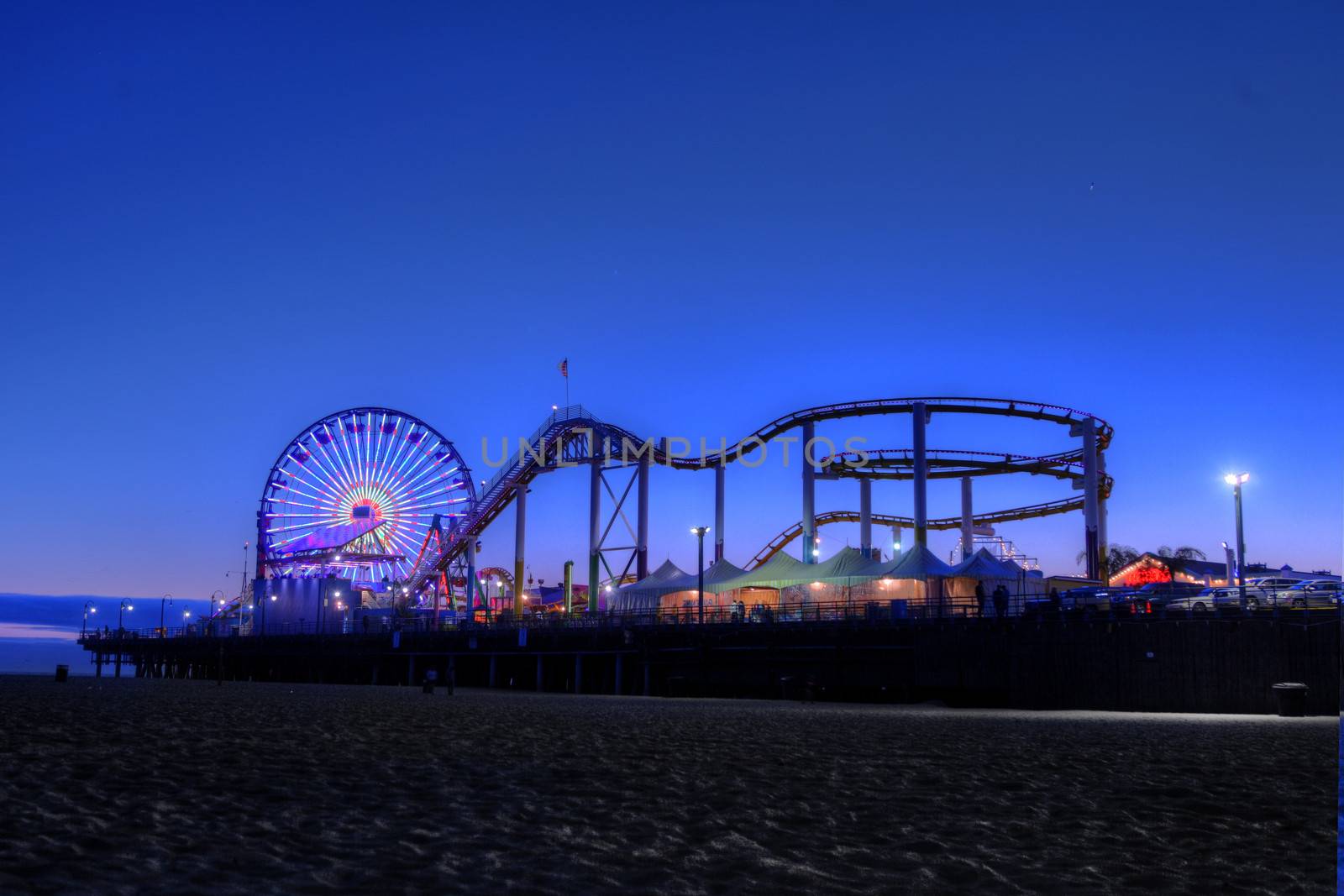 Ferris Wheel and Santa Monica Pier at Twilight in Santa Monica,  by tobkatrina