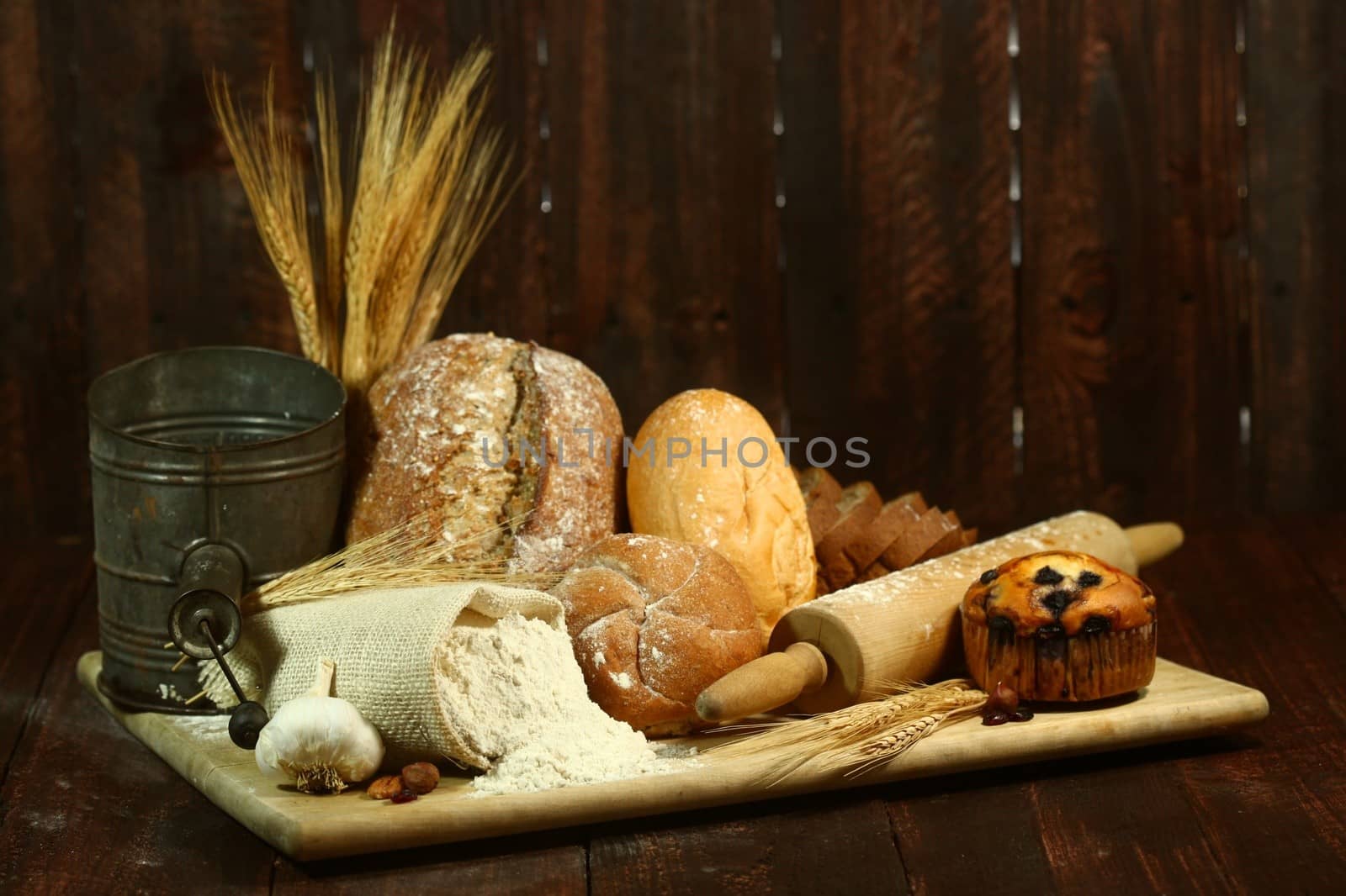 Fresh Baked Bread on Wooden Background