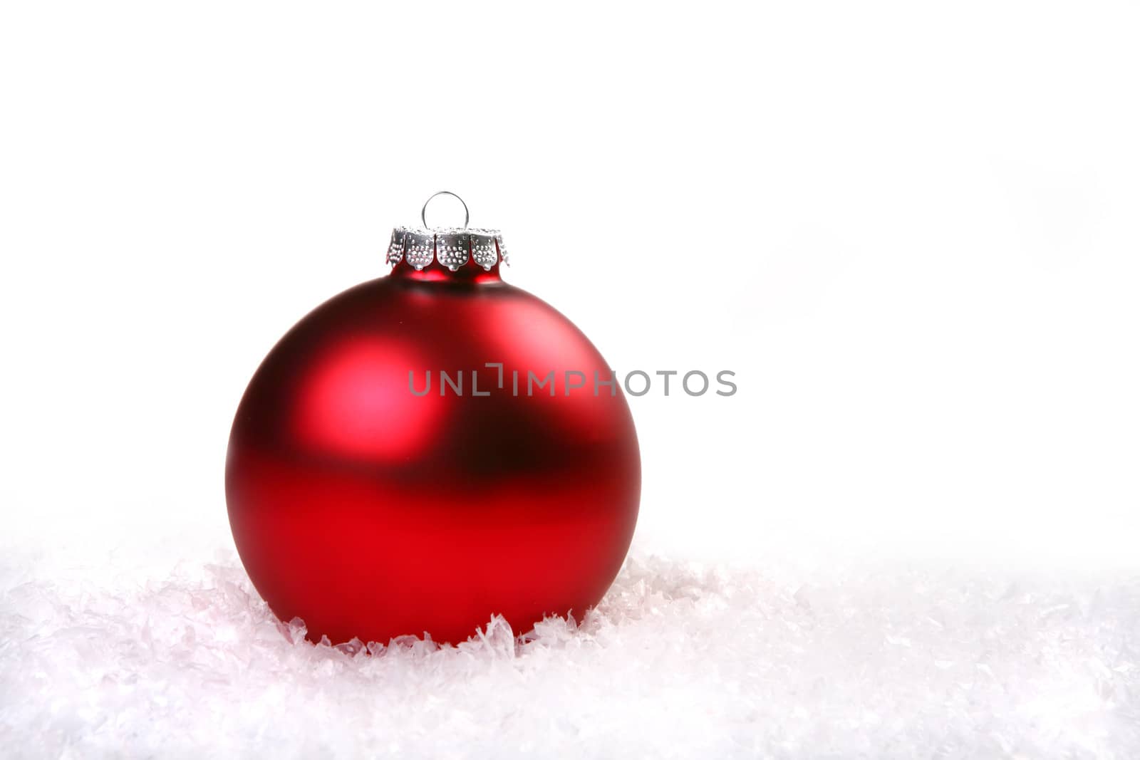 Holiday Christmas Ornament in Snow With Copy Space