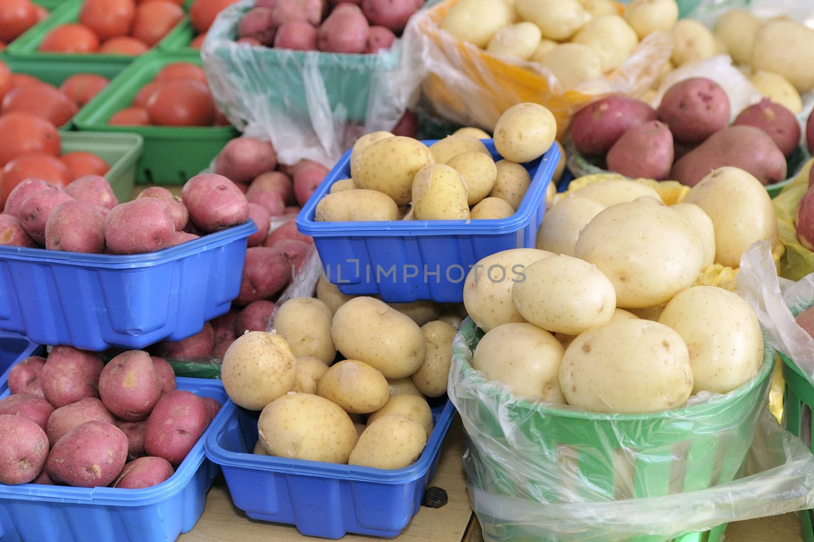 A market of potatoes and vegetables in summer