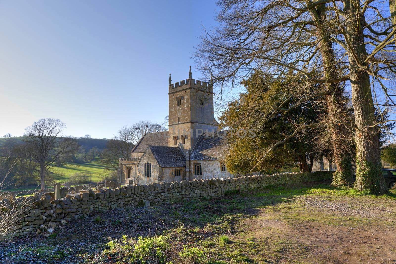 Cotswold church in winter, Gloucestershire, England.