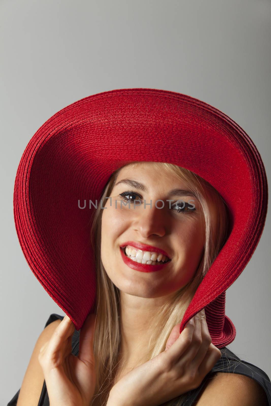smiling woman with a hat