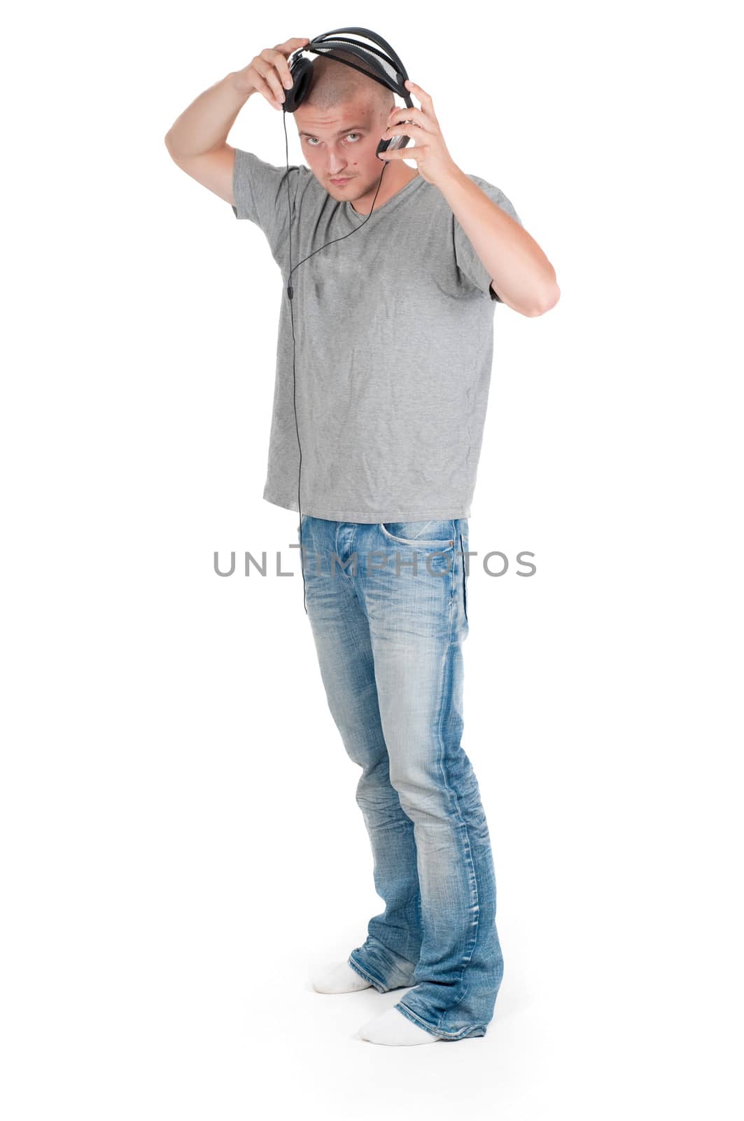 Man in headphones watching on you in studio