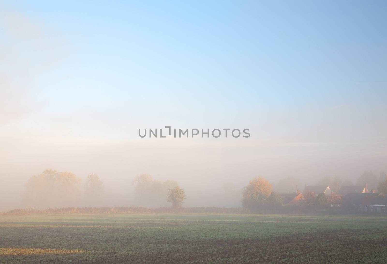 Misty background with houses by andrewroland