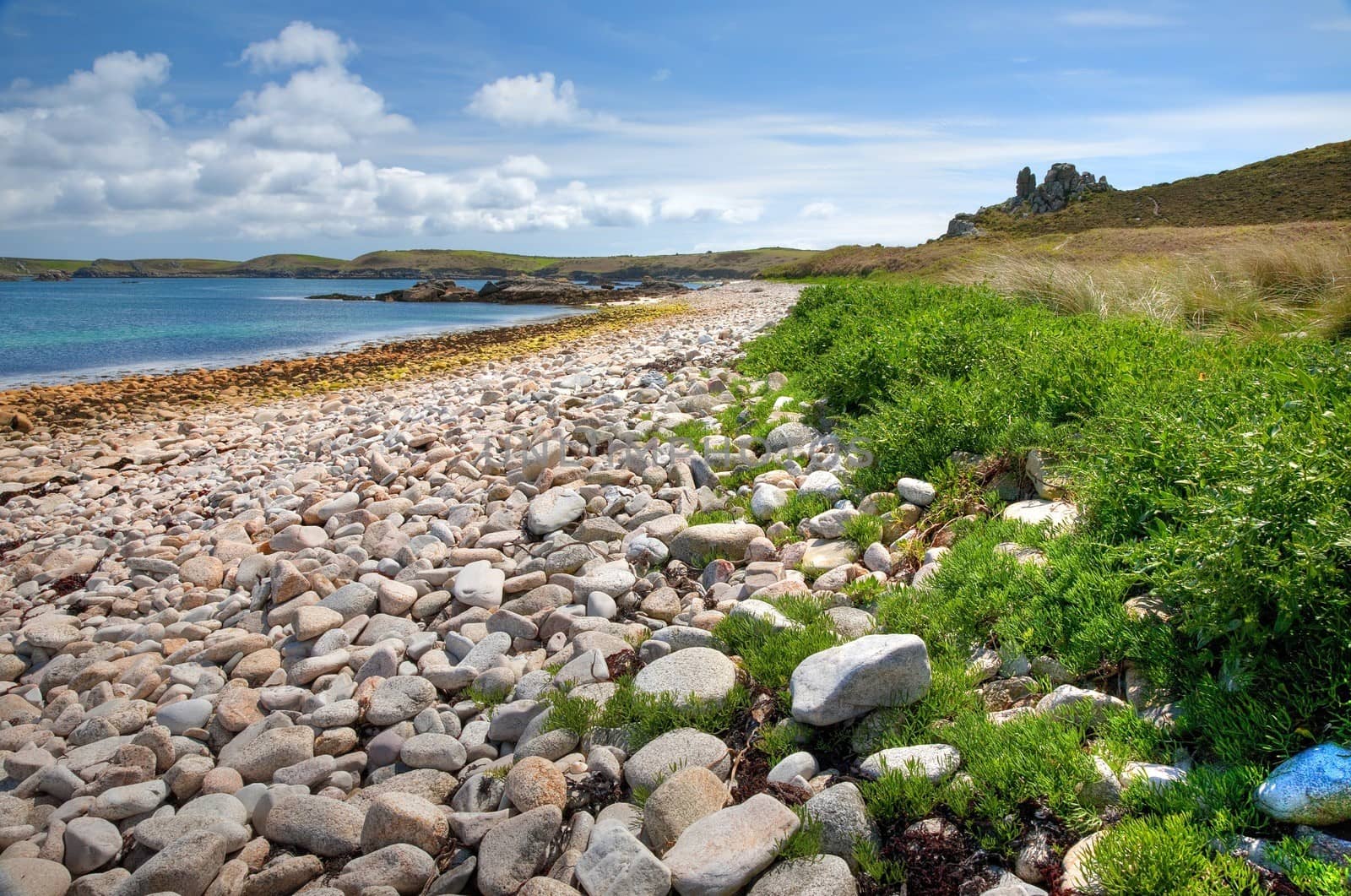 Pebble beach on the Cornish island of St Martin���s, Isles of Scilly, England.