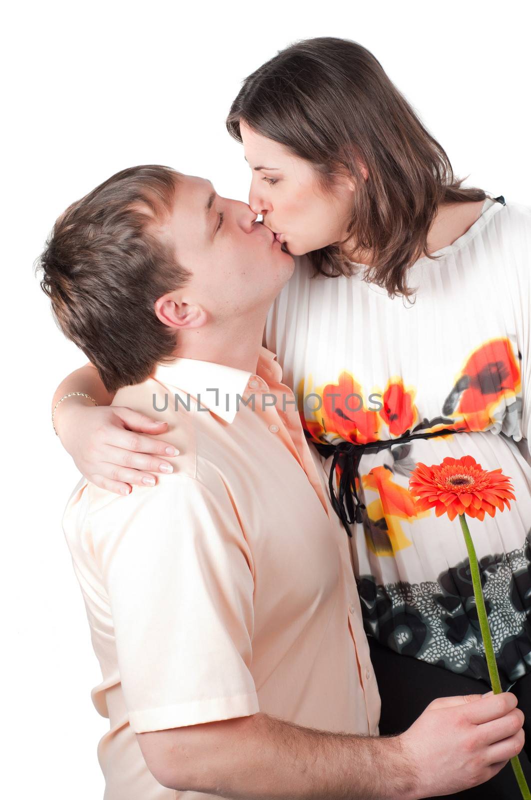 Beautiful kissing couple, isolated on white