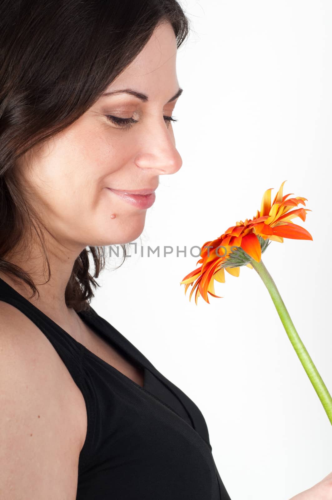 Shot of young beautiful woman on light background