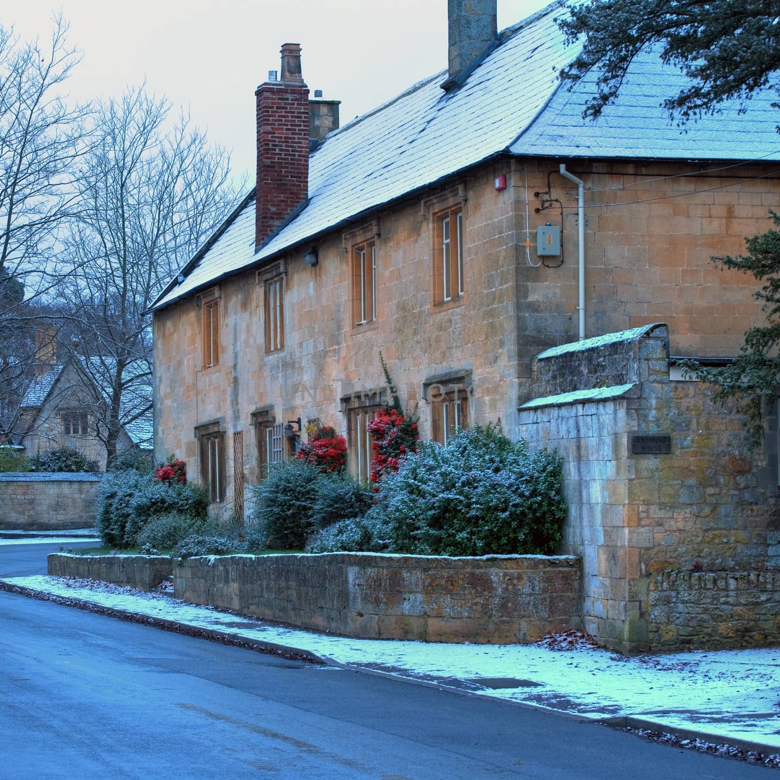 Terraced Cotswold stone cottages at Mickleton near Chipping Campden in winter, Gloucestershire, England.