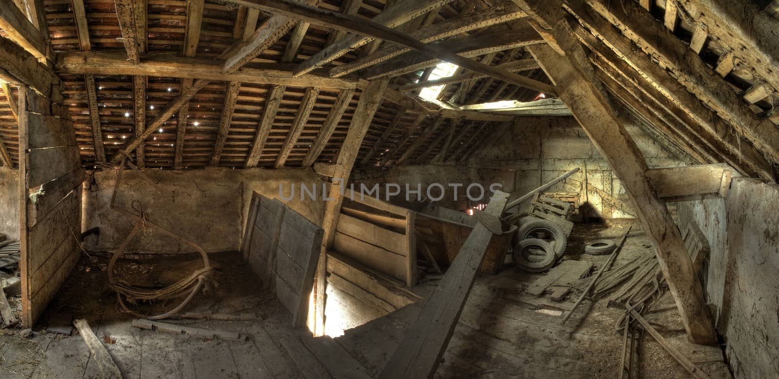 Timber-frame and wattle and daub constructed English granary interior.