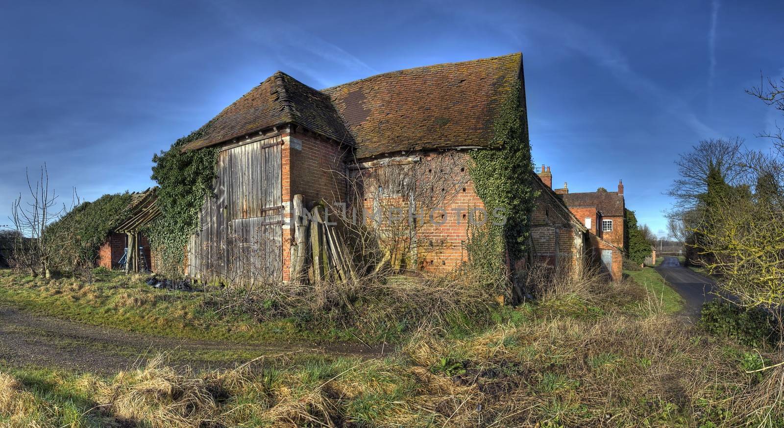 Overgrown and derelict hay barn, Warwickshire, England.
