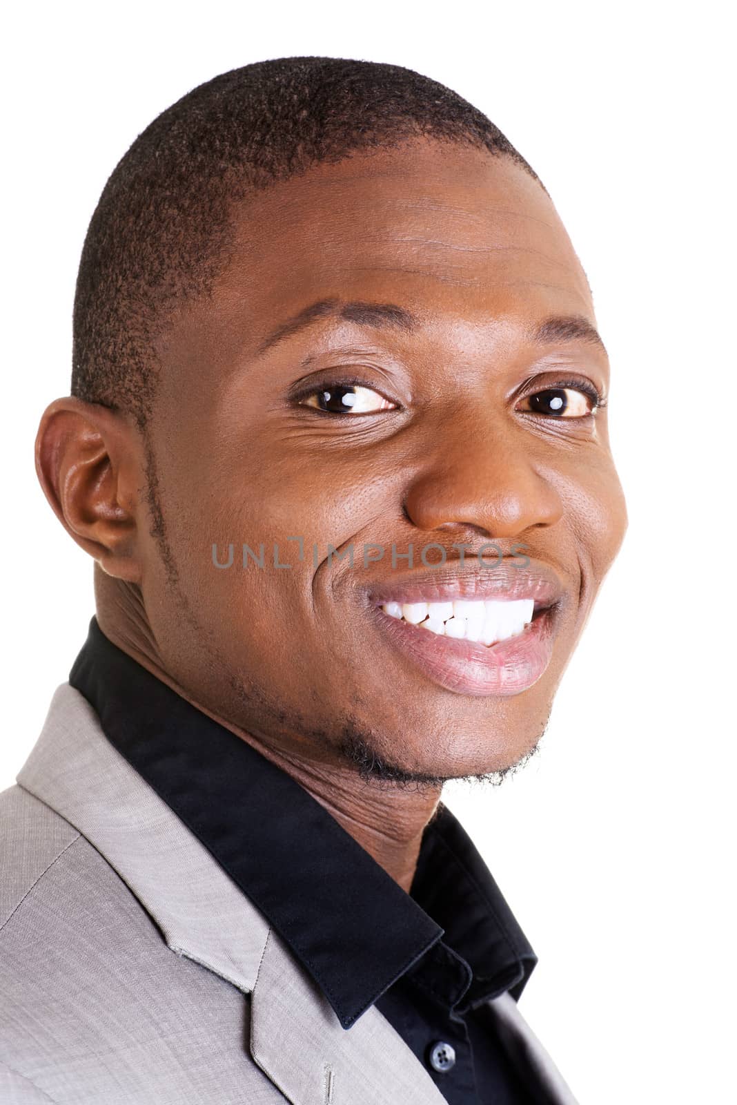 Happy smart black businessman smiling, isolated on white.