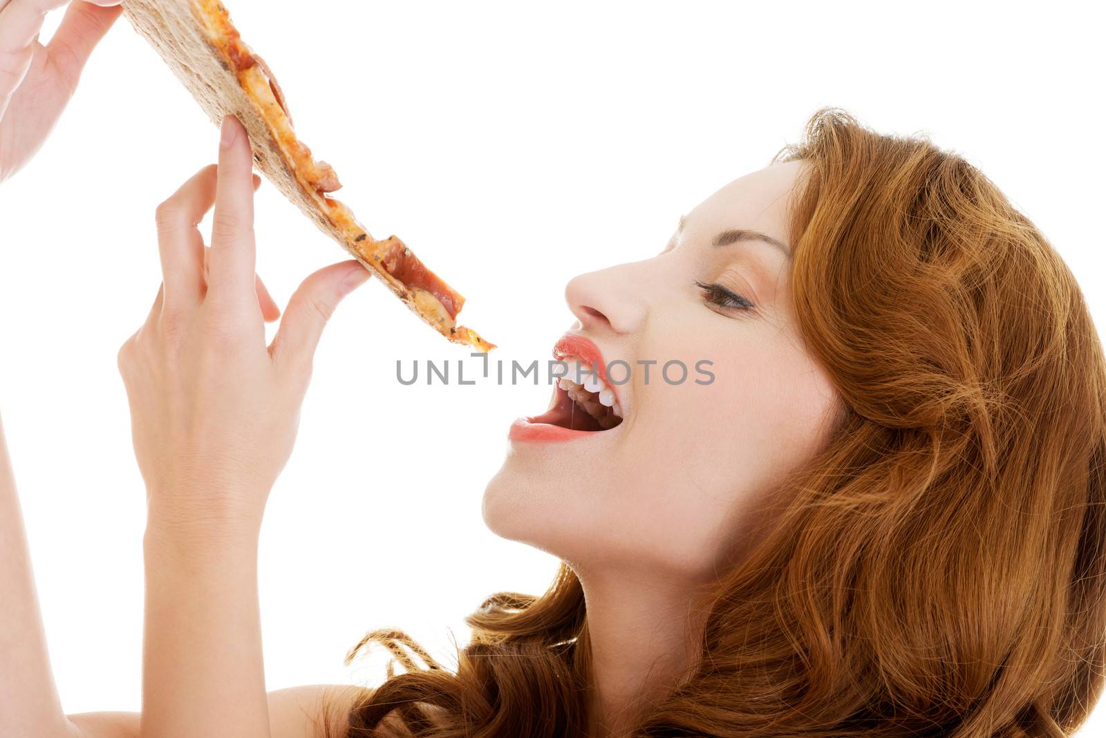 Happy woman eating pizza. Over white background.