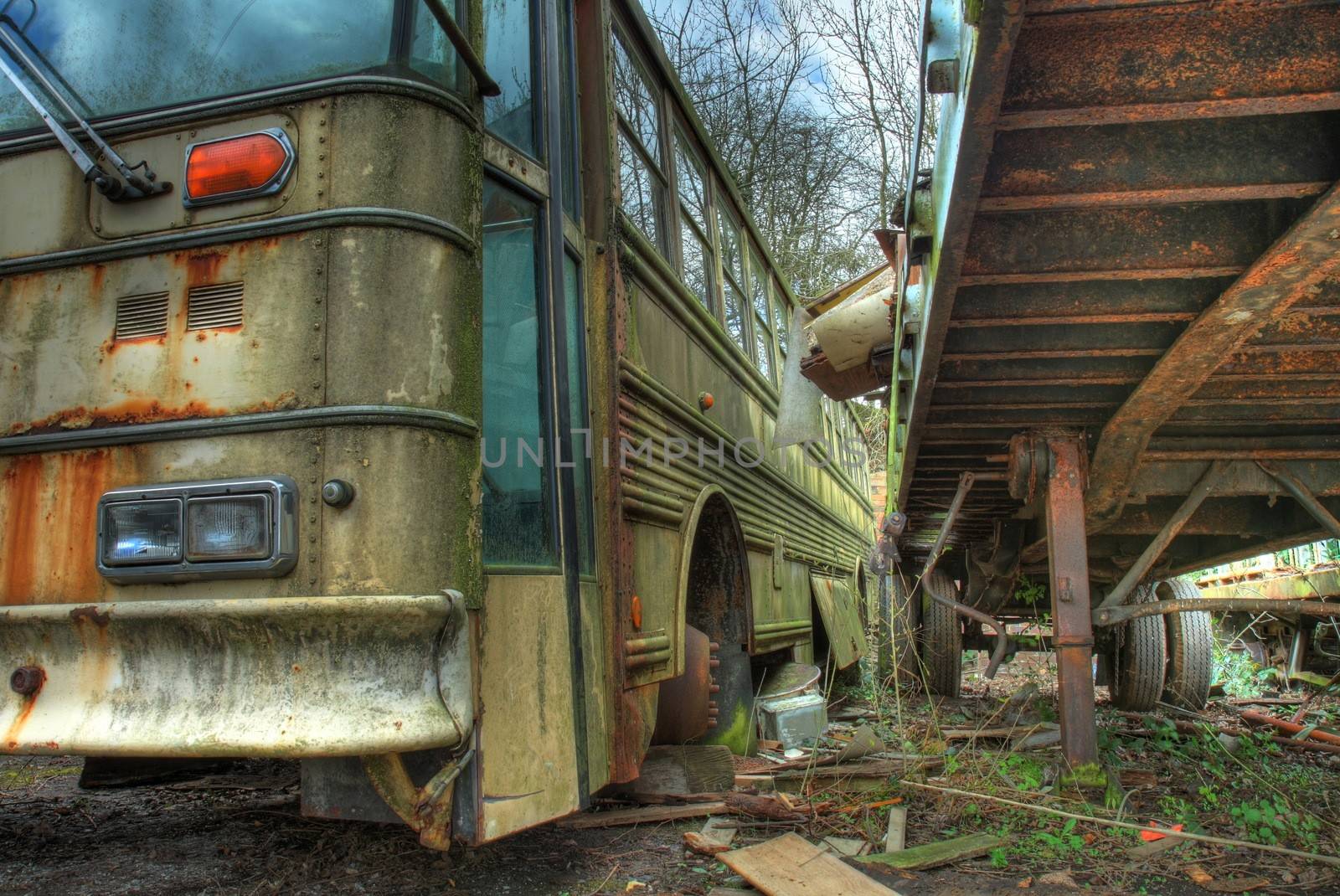 Old coach and trailer at scrapyard, Worcestershire, England.