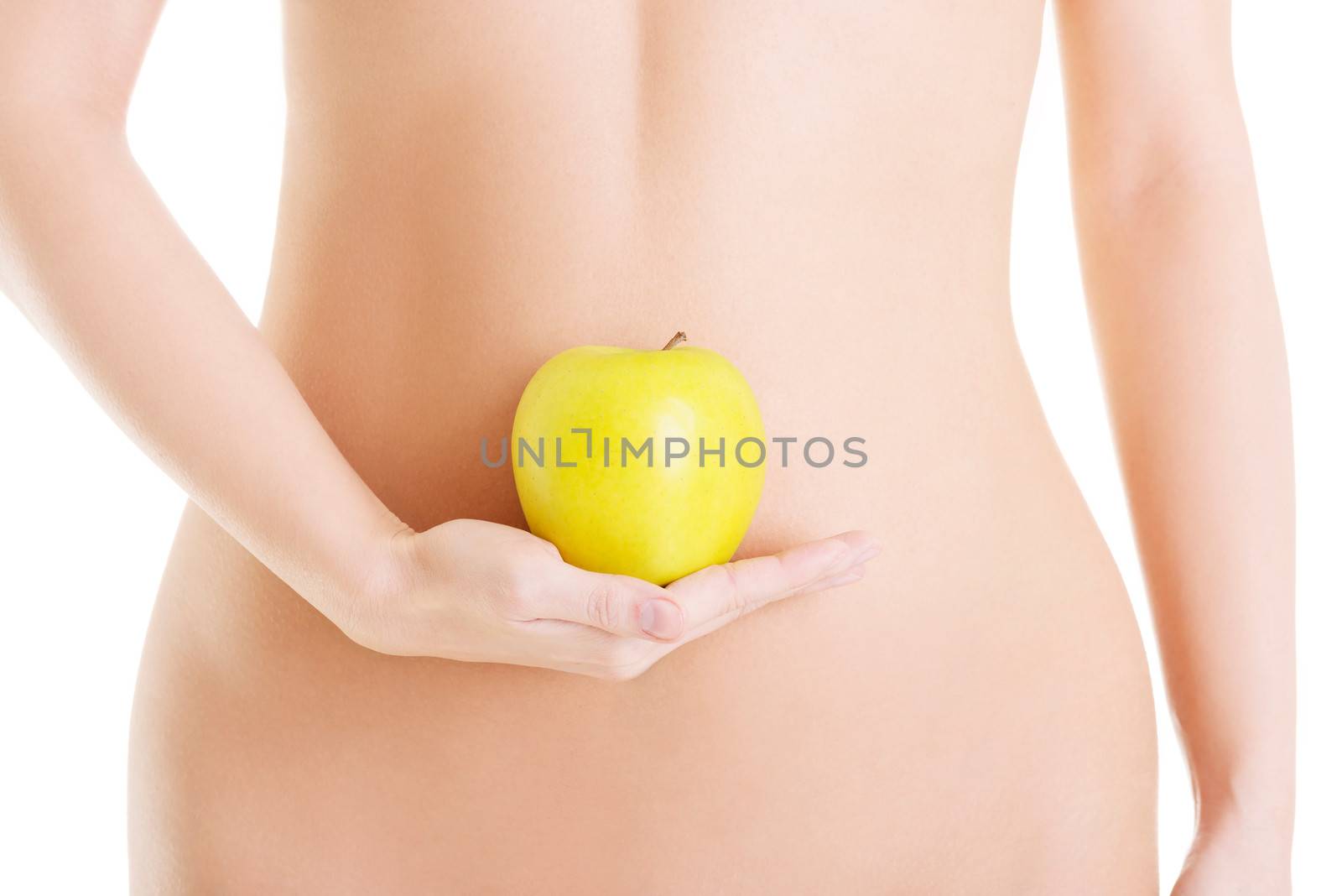 Beautiful female body and apple on white background
