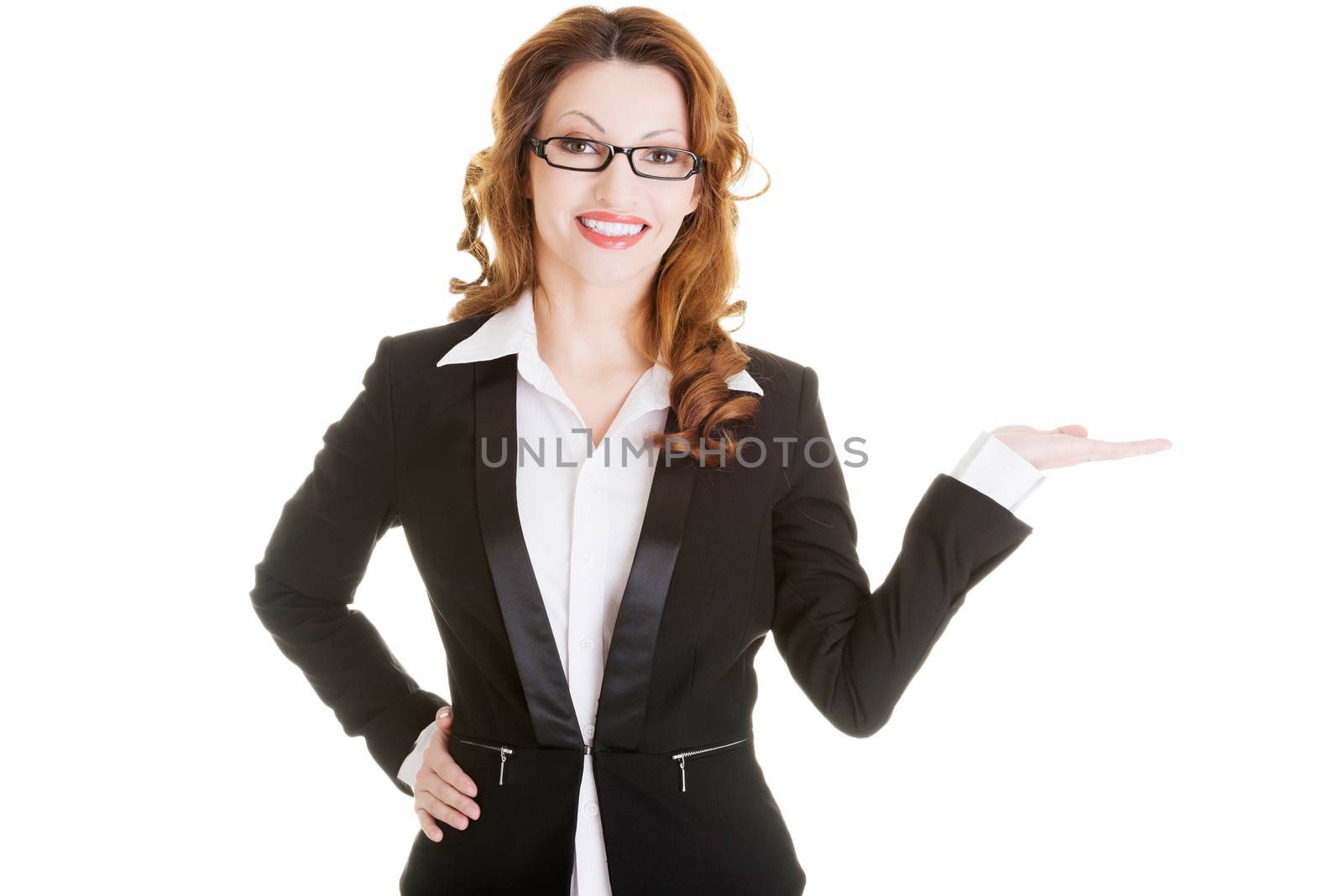 Businesswoman showing copy space on her palm by BDS