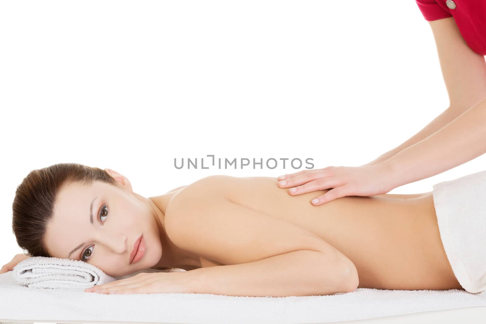 Preaty woman relaxing beeing massaged in spa by BDS