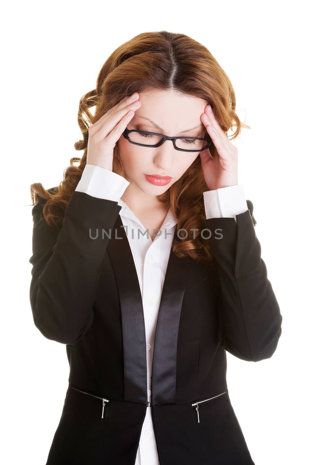 Businesswoman with a headache holding head, isolated on white background