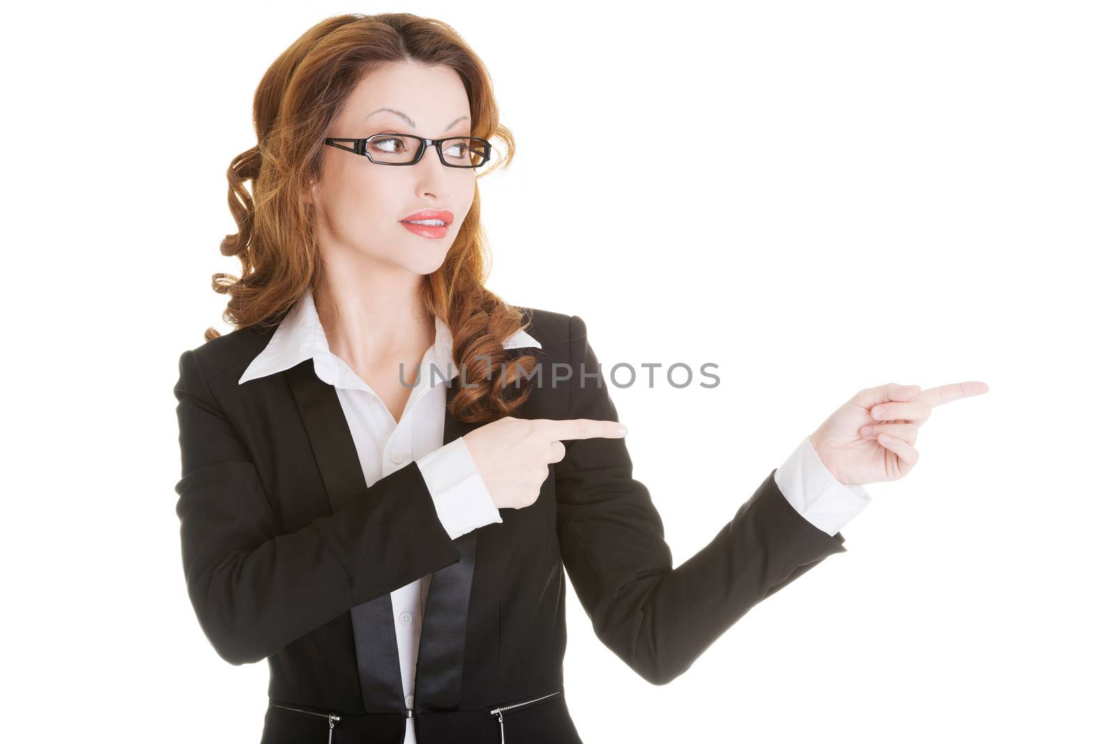 Happy success business woman pointing on copy space, isolated on white
