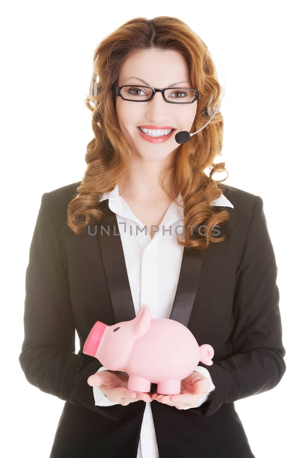 Business woman with headset holding piggy bank by BDS