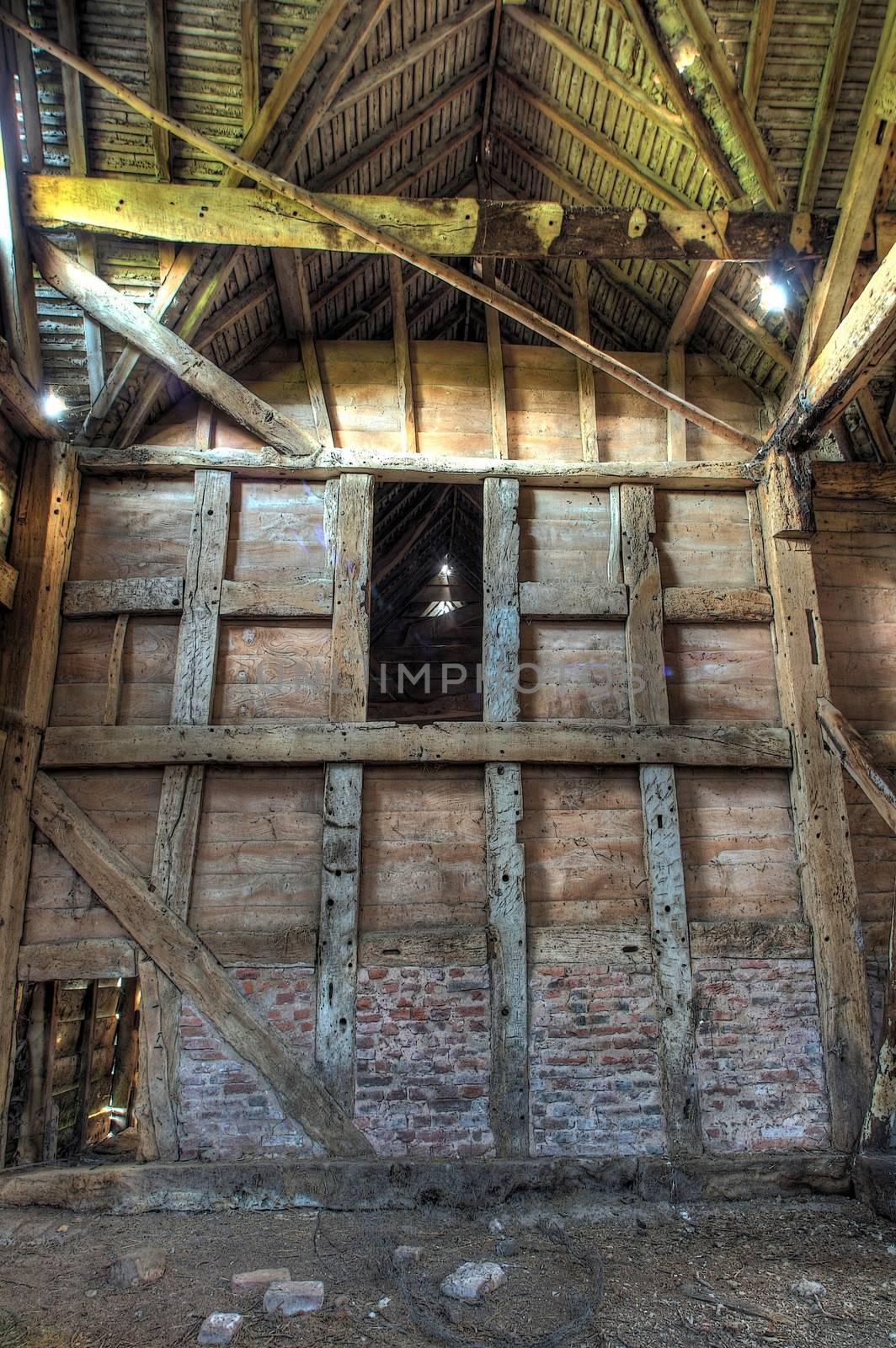 Large timber-framed and brick hay barn, Worcestershire, England.