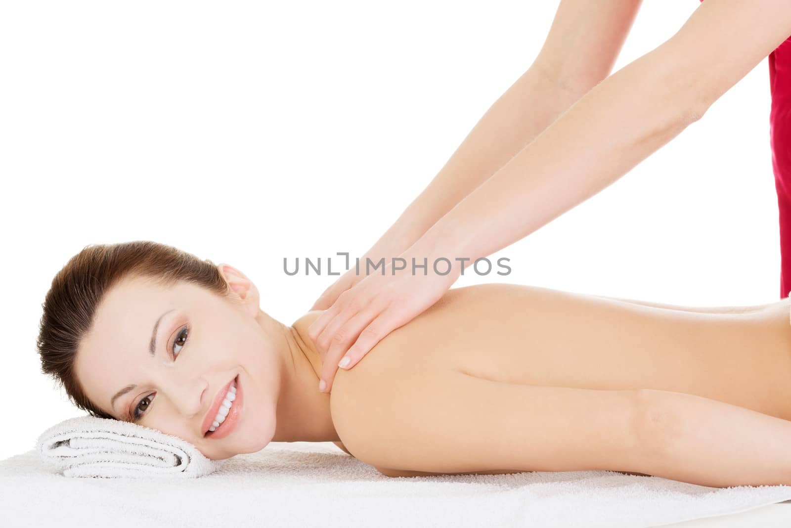 Preaty woman relaxing beeing massaged in spa by BDS