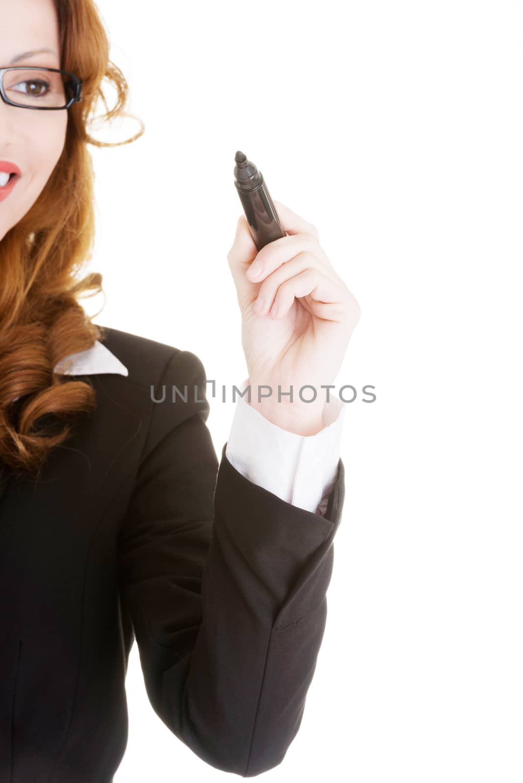 Businesswoman with a marker, isolated on white background