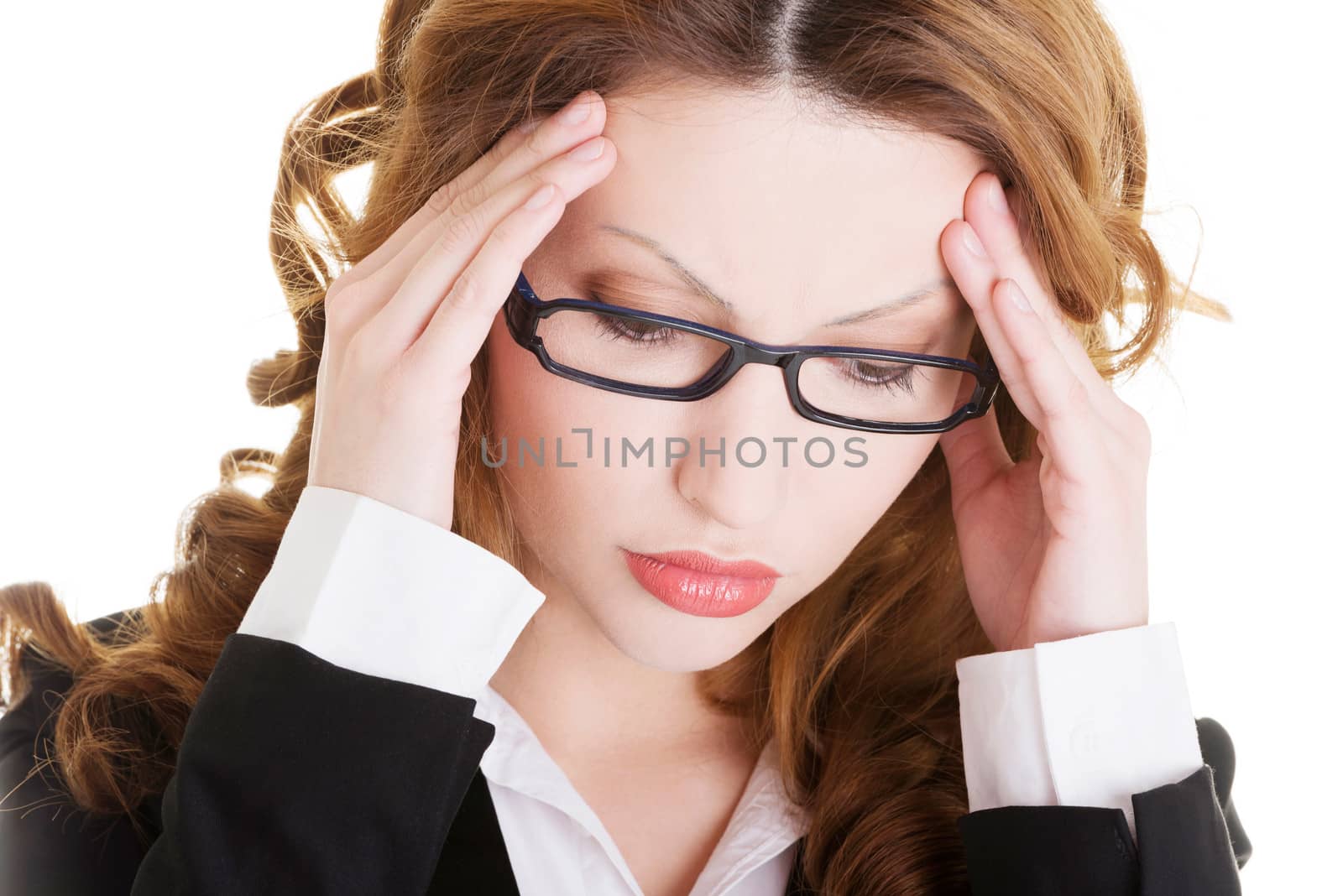 Businesswoman with a headache holding head, isolated on white background