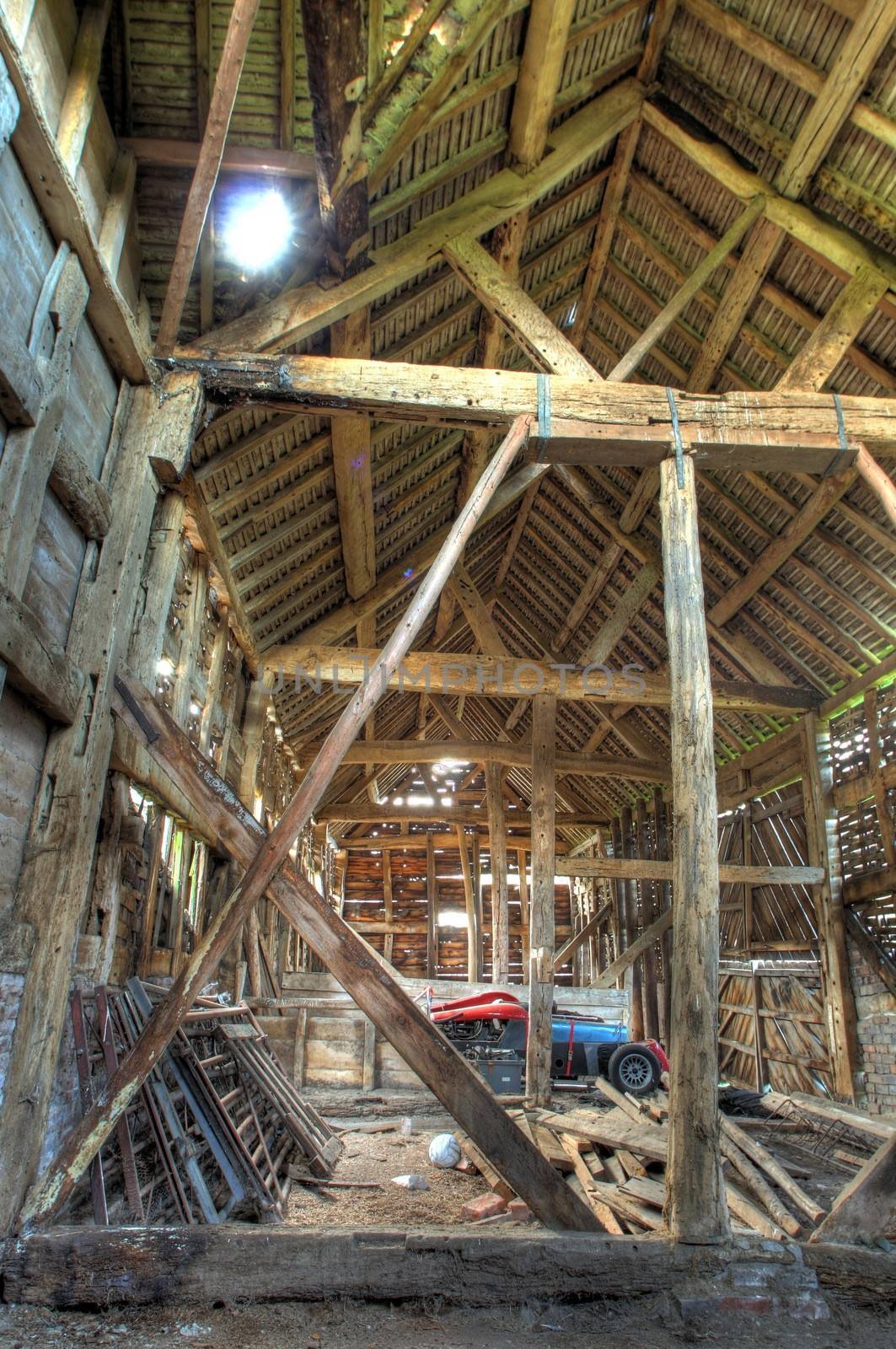 Large timber-framed and brick hay barn, Worcestershire, England.