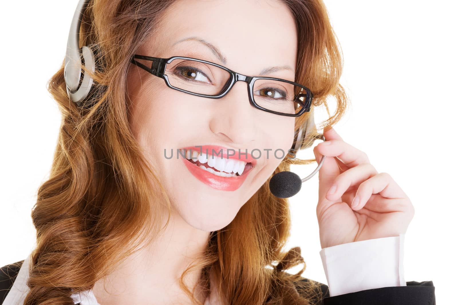 Beautiful call-center assistant smiling , isolated on white