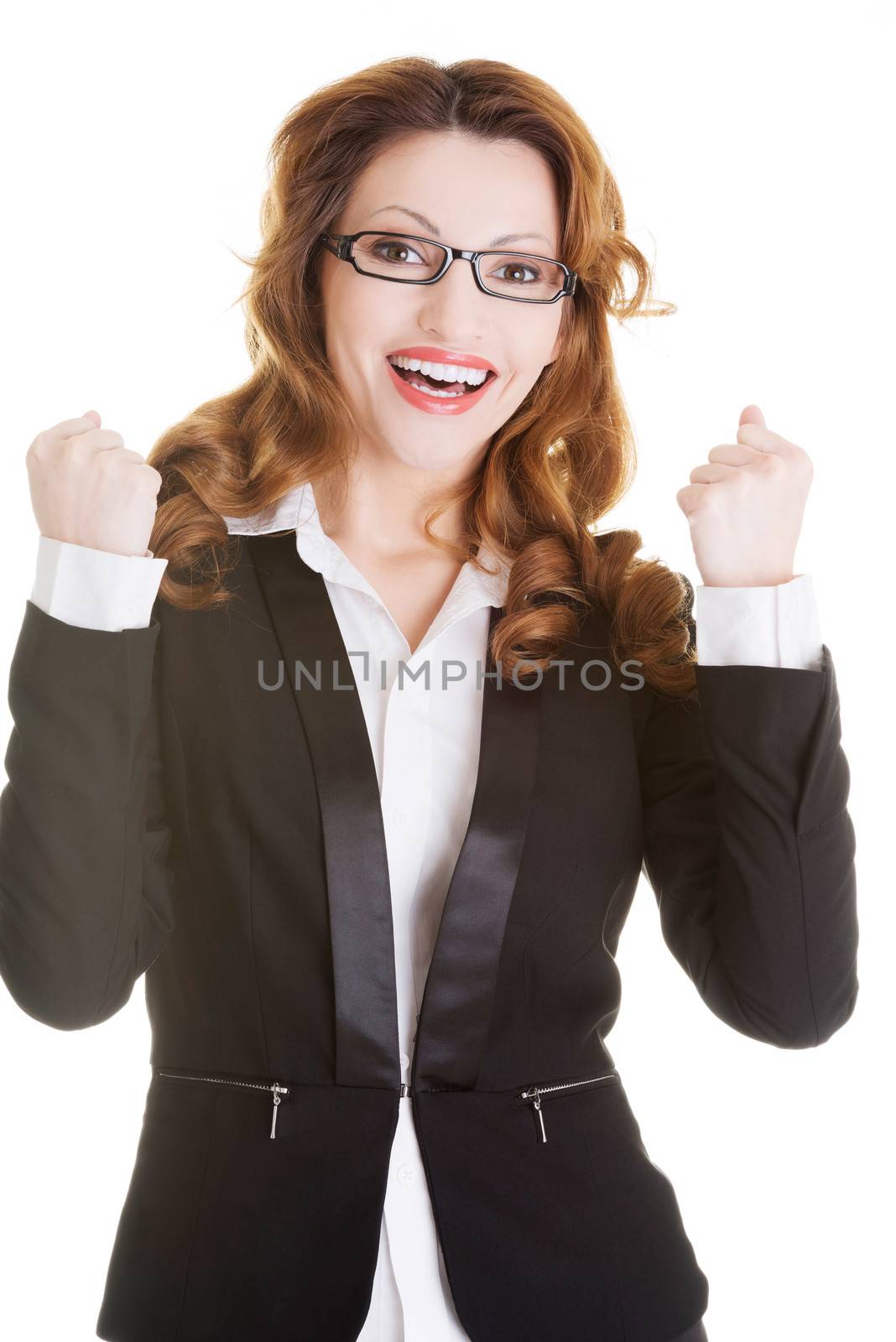Success, winner businesswoman with fists up, isolated on white.