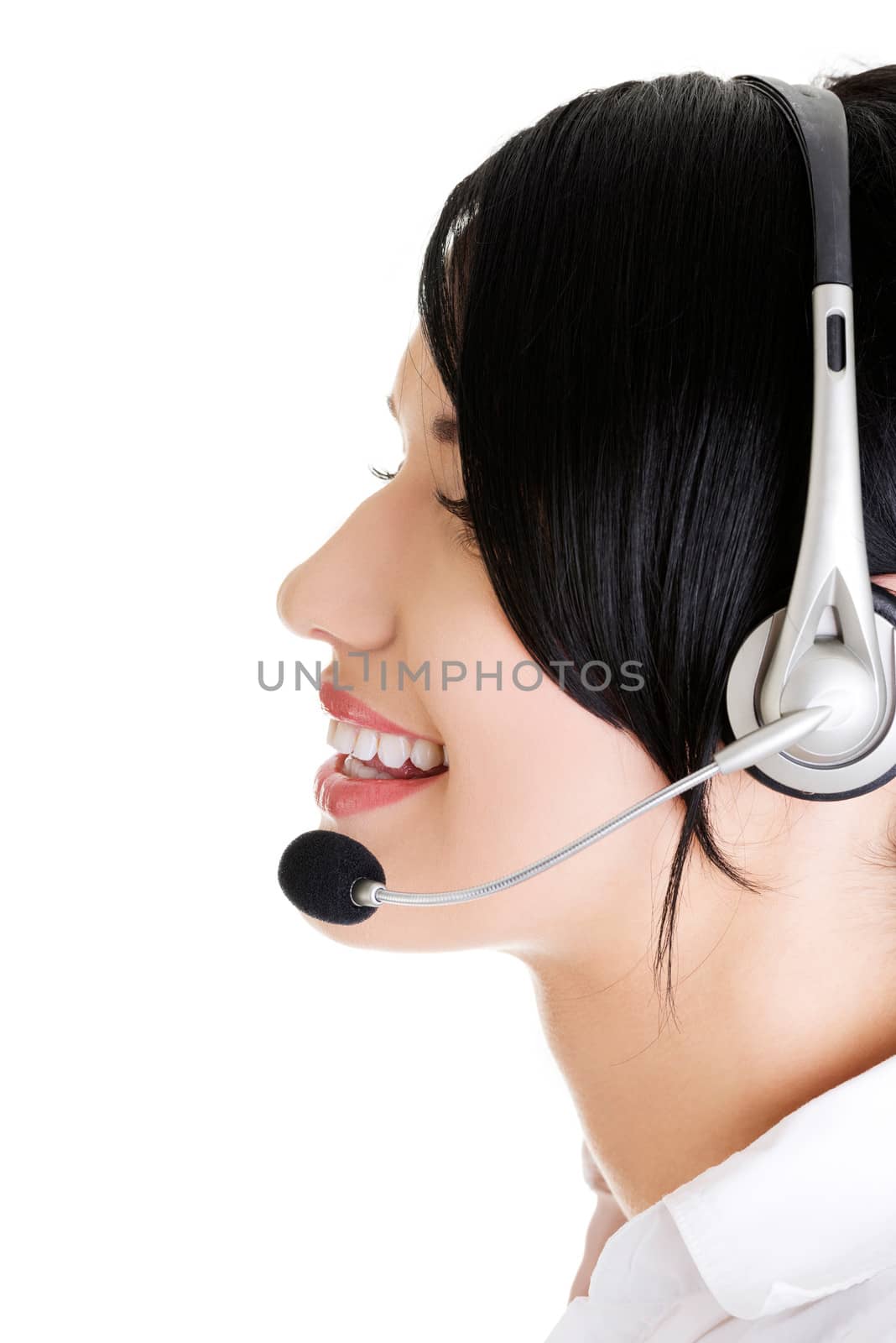 Beautiful young call-center assistant smiling , isolated