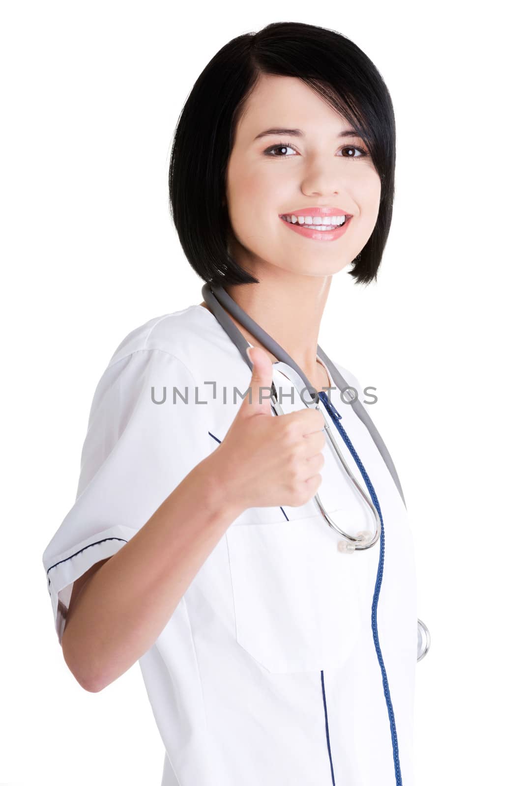 Young female doctor or nurse gesturing OK by BDS